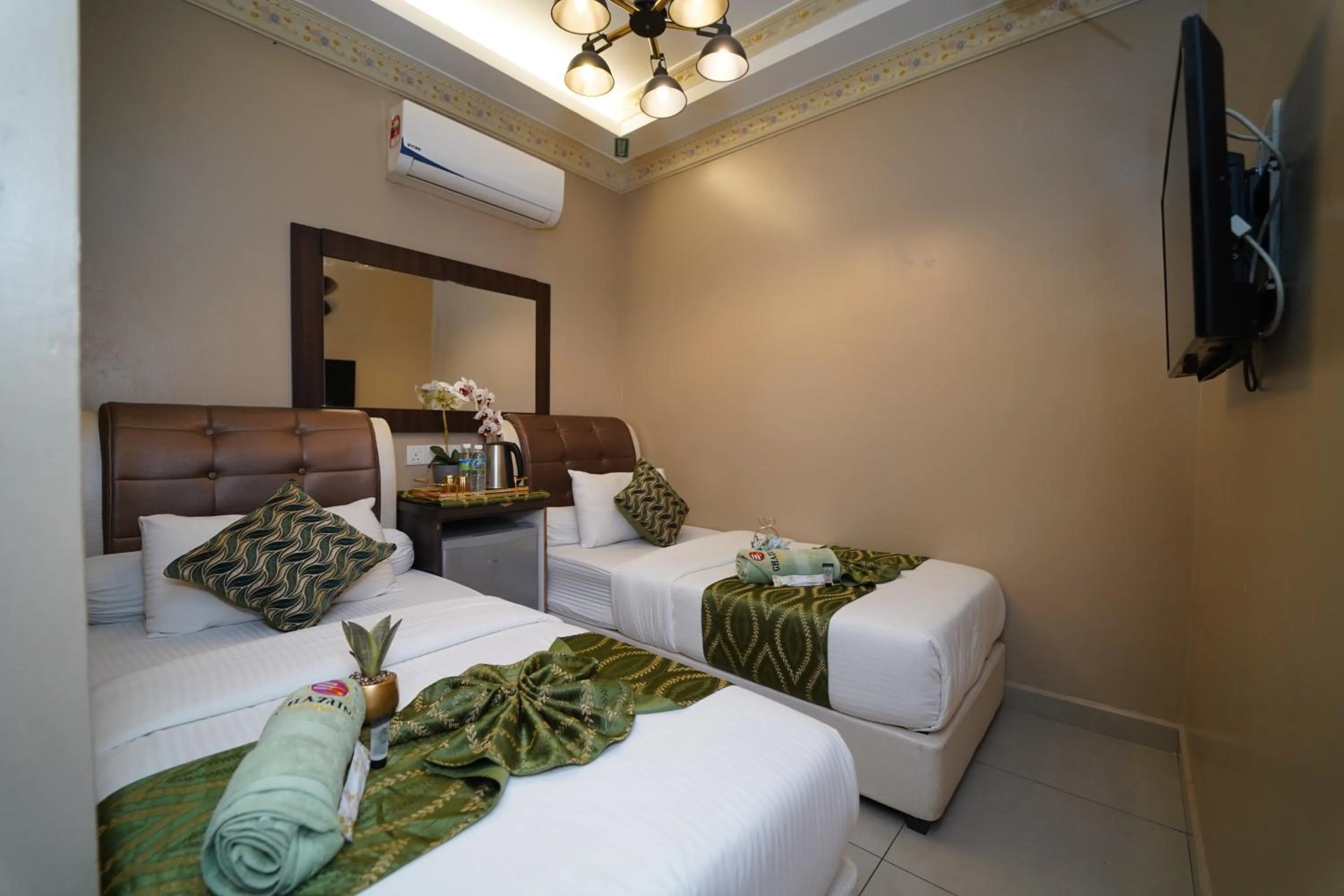 Bed in Ghazrin's Classic Hotel JB