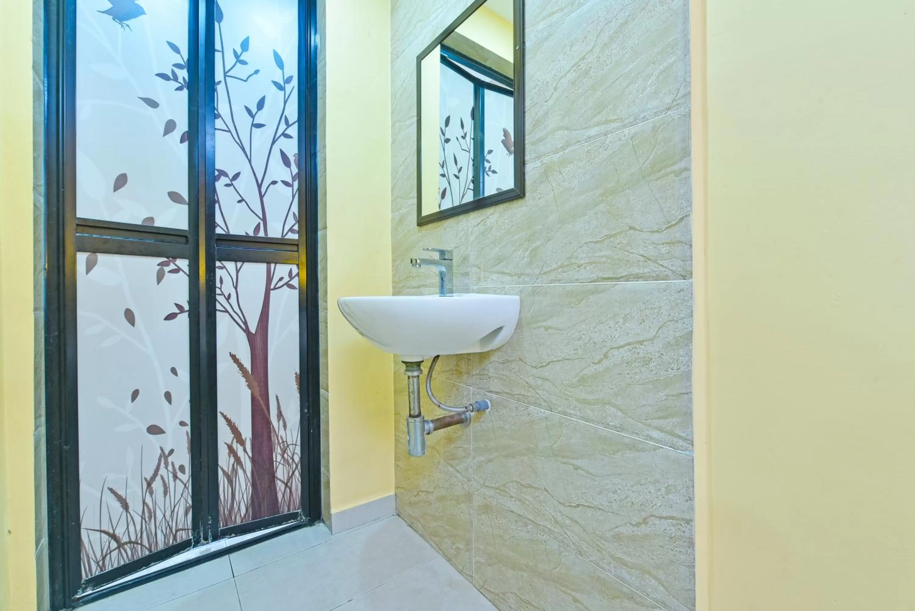 Bathroom in OYO 90521 De Mawardah Inn