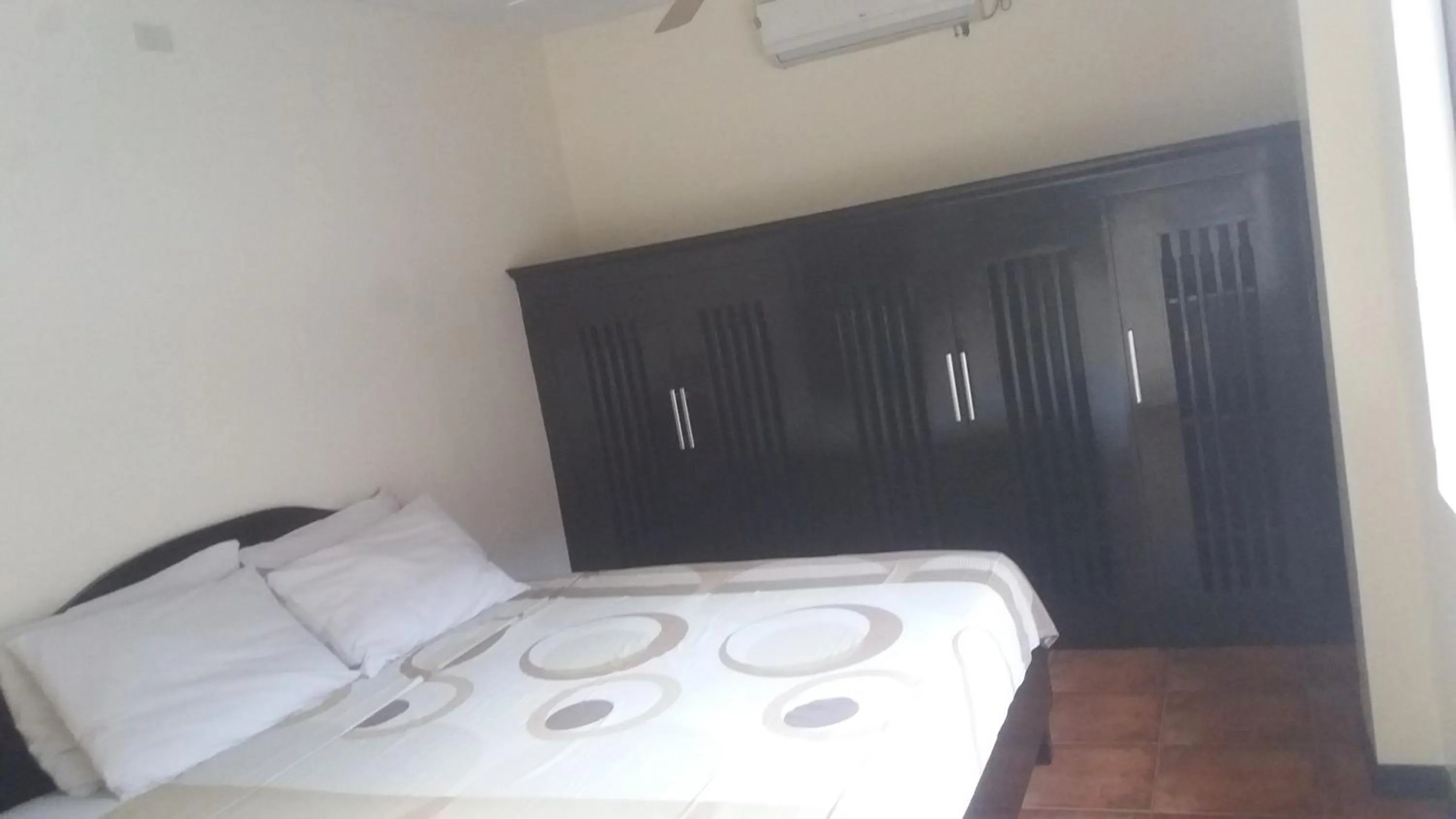 Bed in Boomerang Hotel