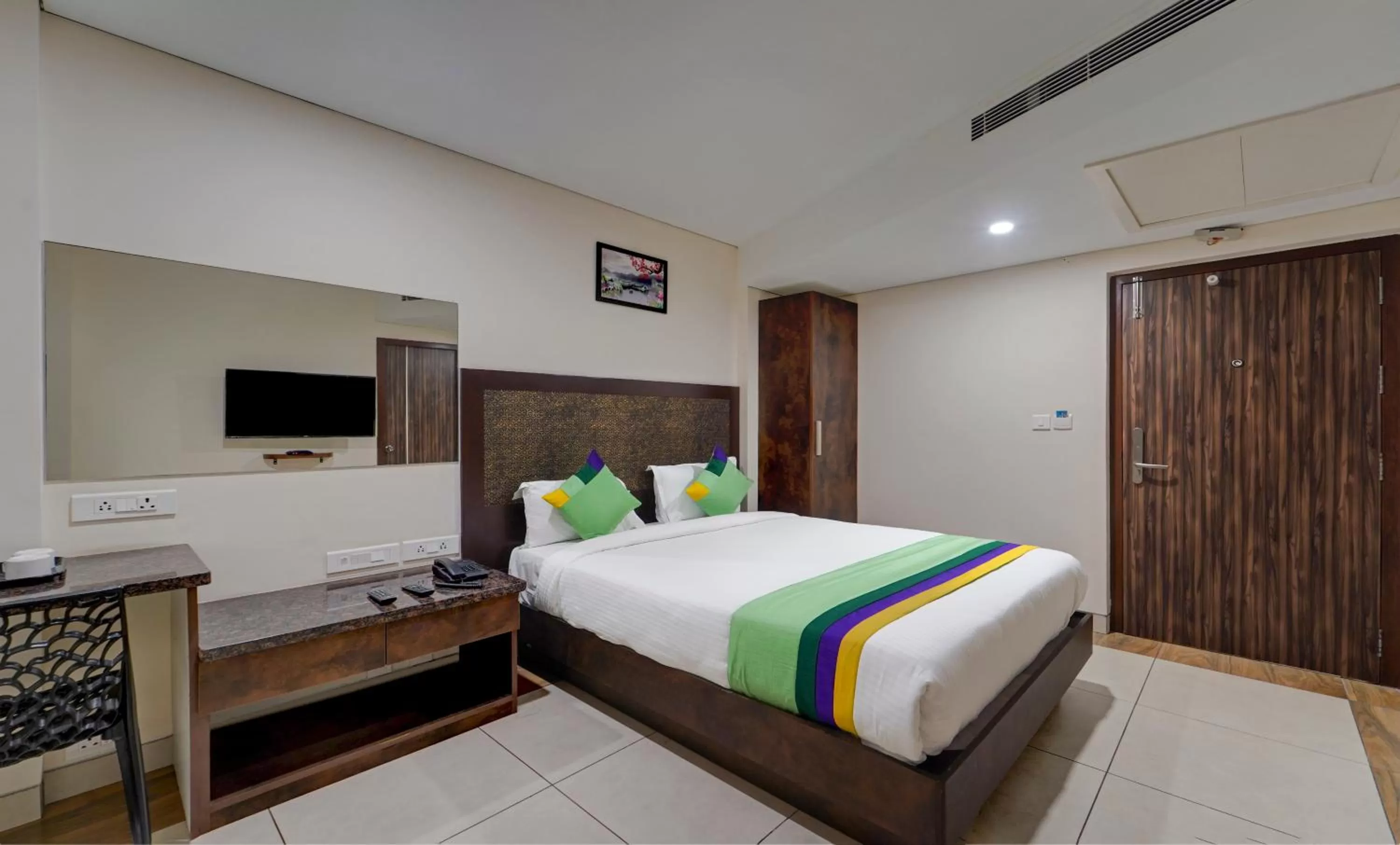 Bed in Treebo Vetri Supreme Residency
