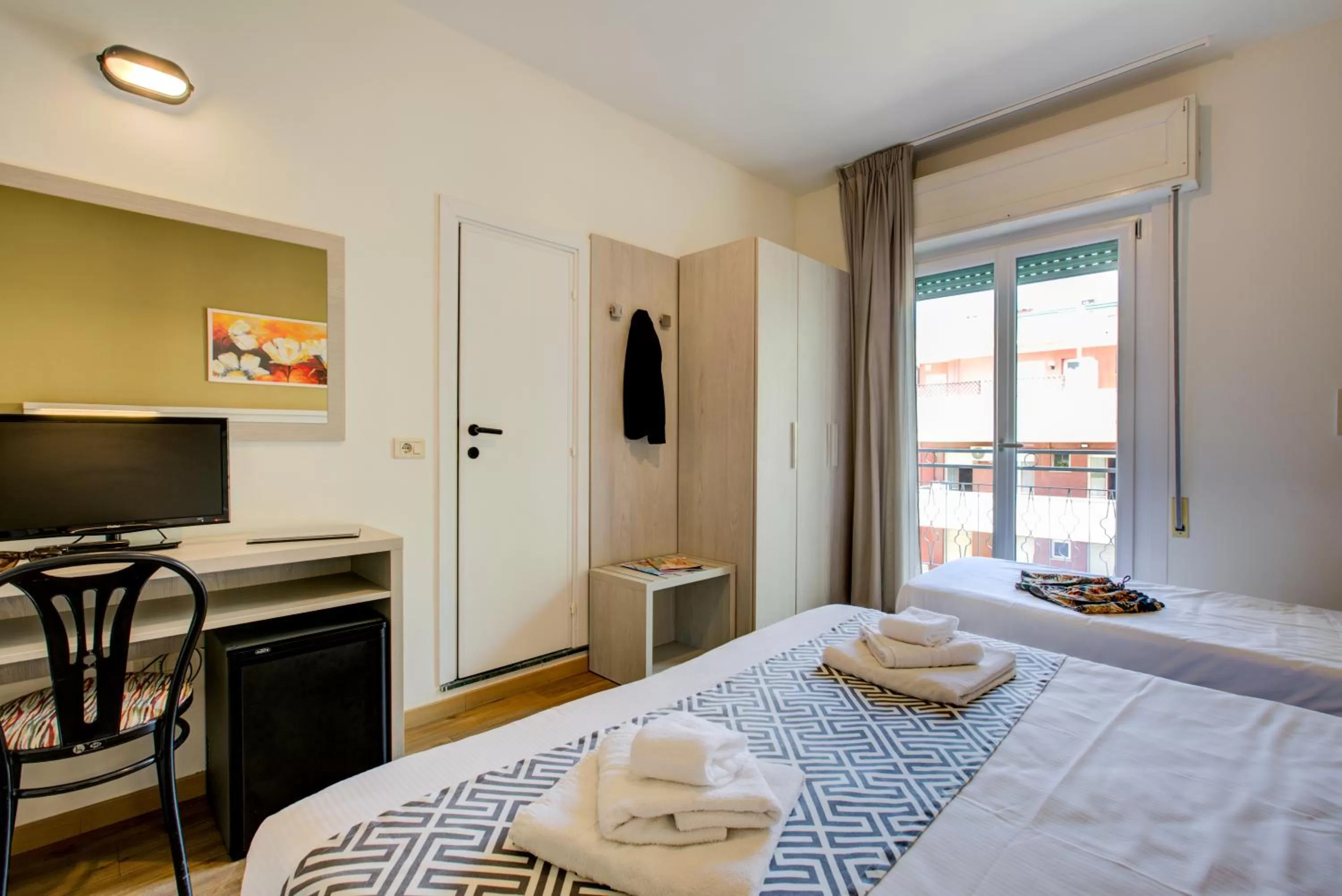 Communal lounge/ TV room, Bed in Hotel Christian Ideale Per Famiglie