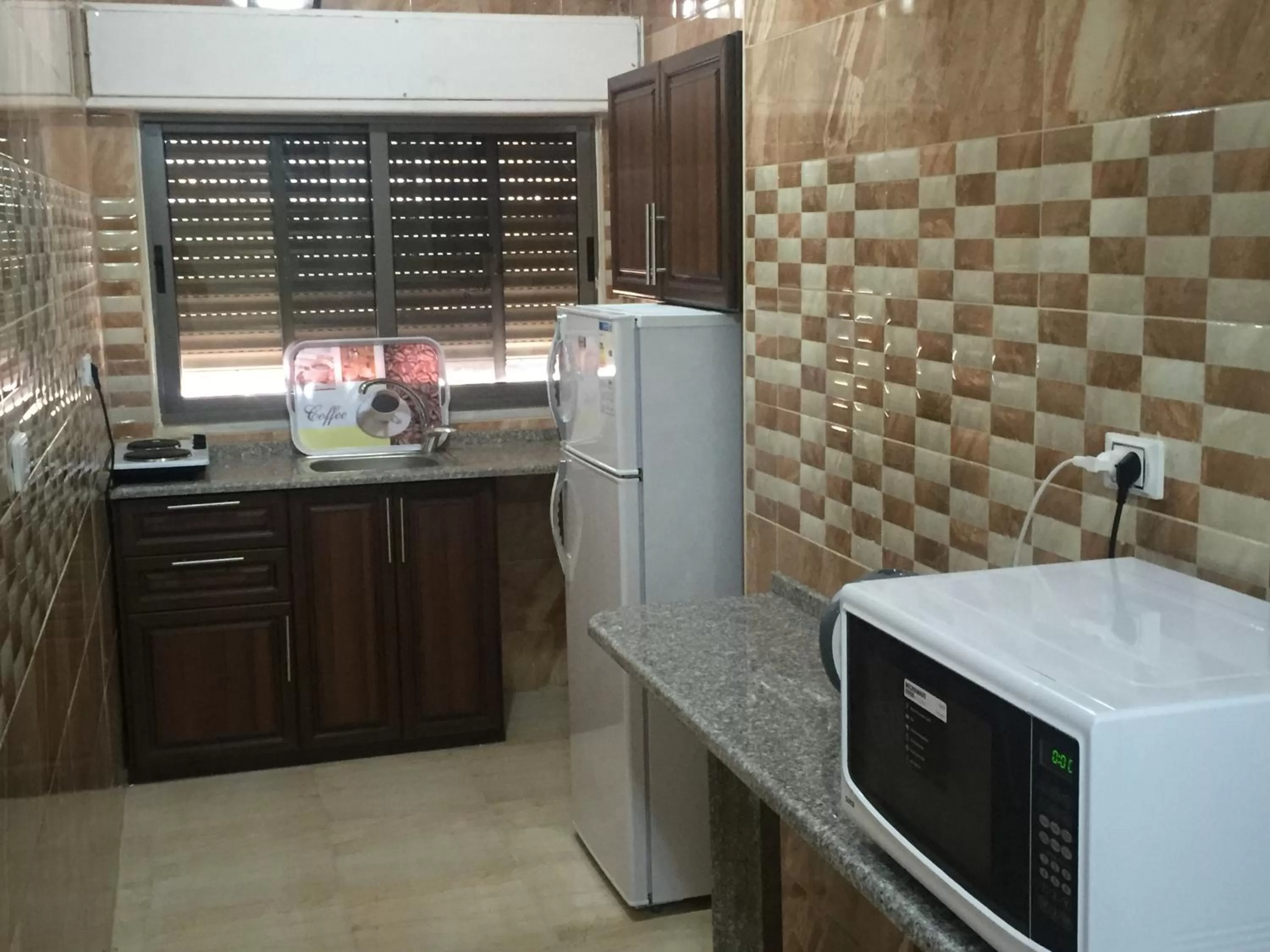 Kitchen/Kitchenette in Al haramain Furnished Apartments