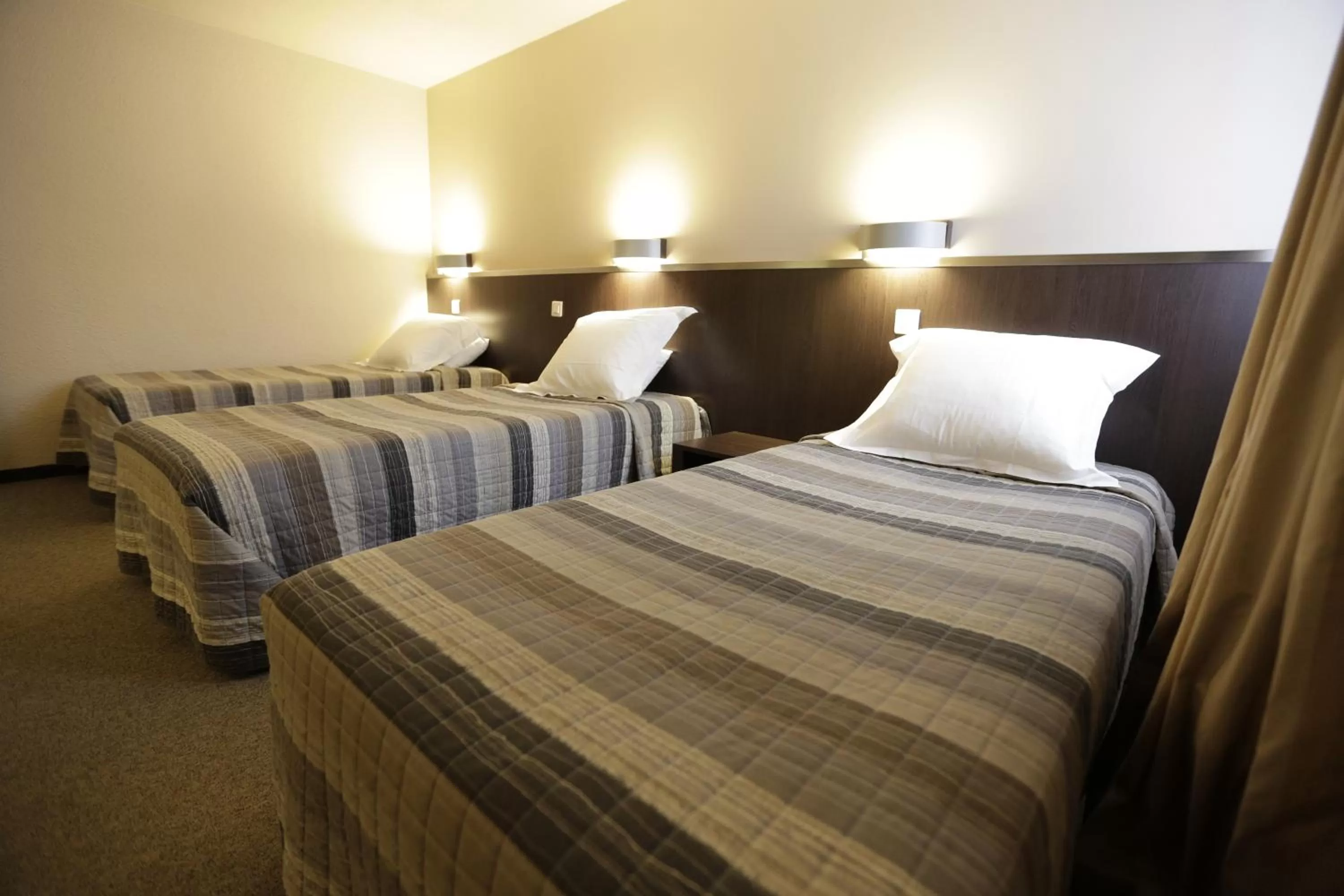 Bedroom, Bed in Hôtel Au Petit Caporal