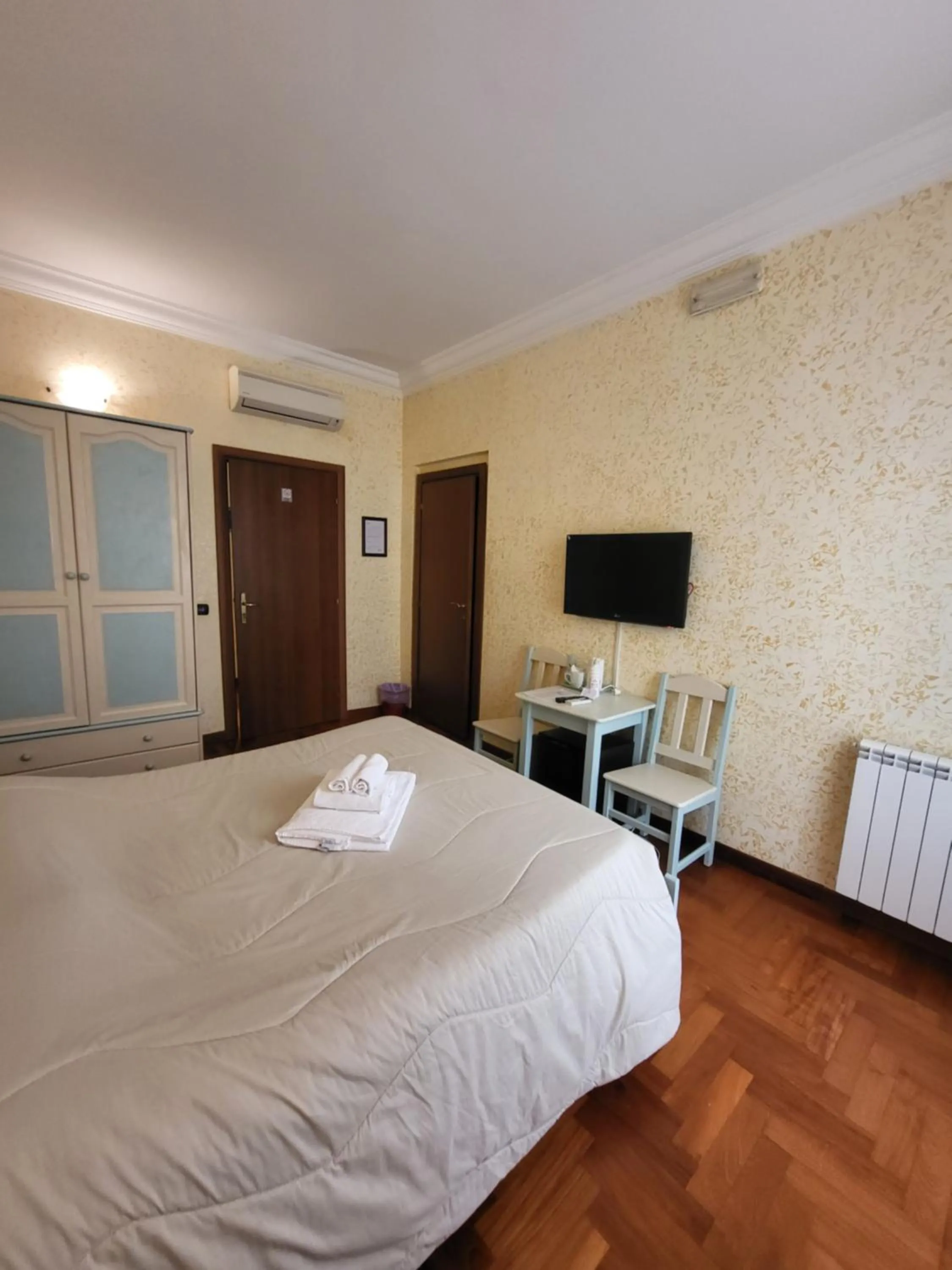 Bed in St. Peter's Rooms Rome