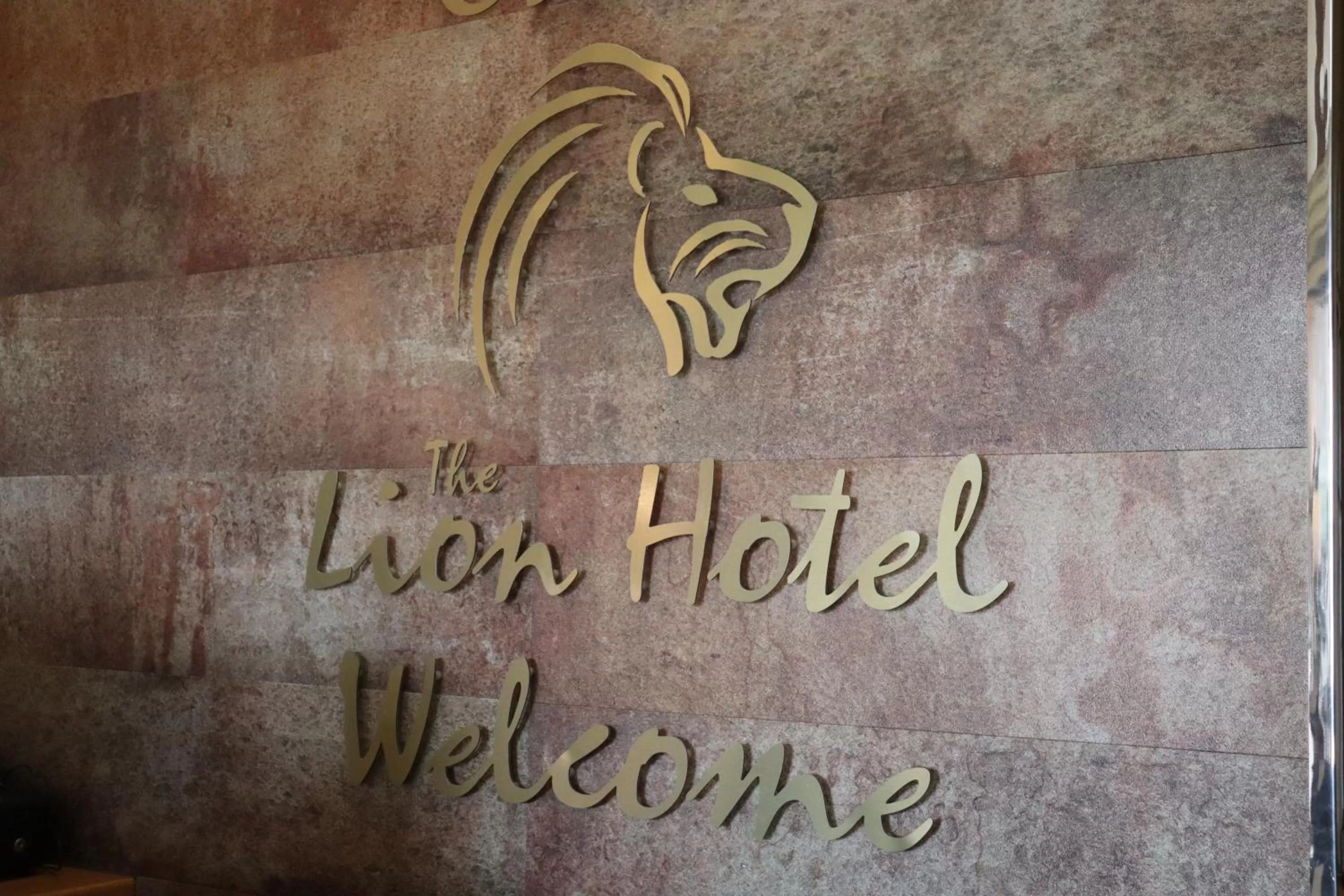 Property logo or sign in Lion Hotel & Studio Apartments