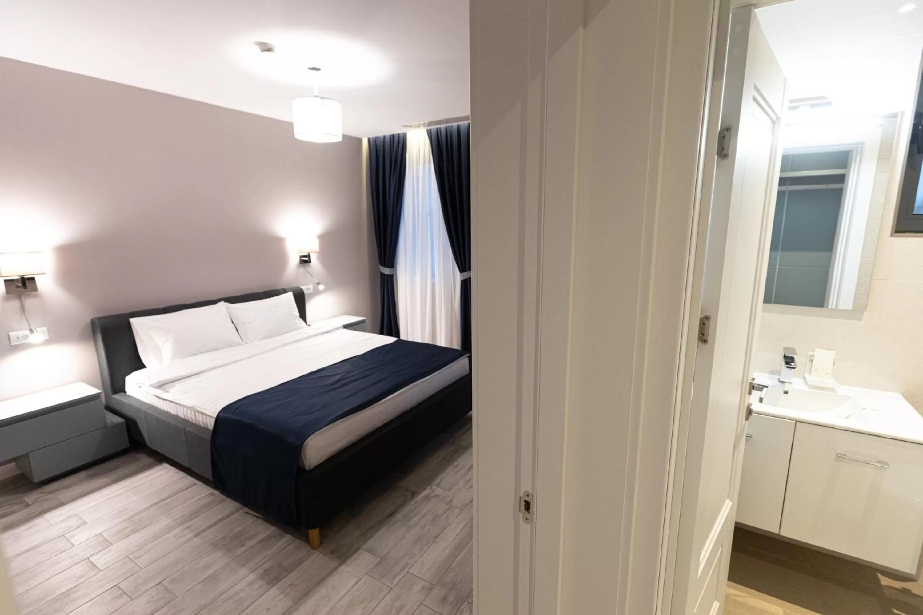 Bedroom in Omnia Apartments