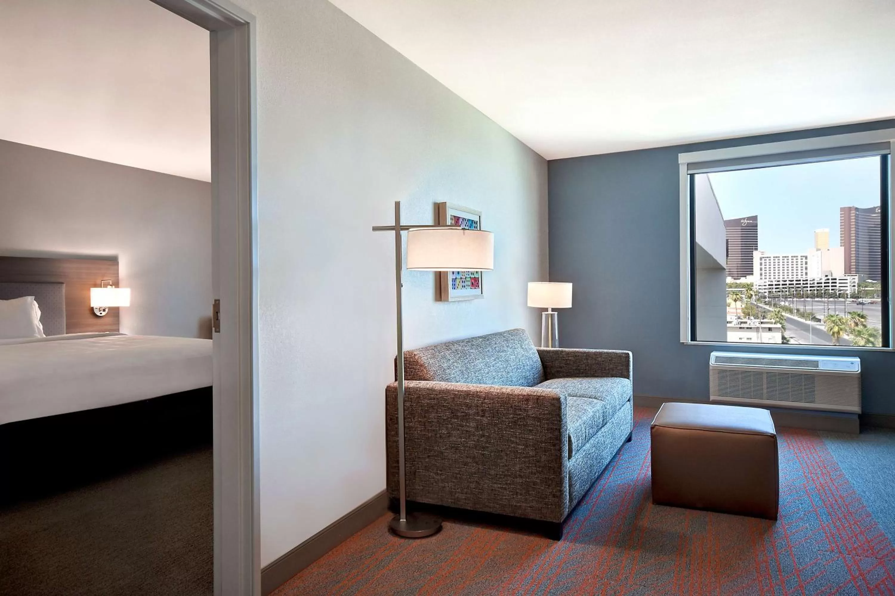 Living room, Bed in Home2 Suites by Hilton Las Vegas Convention Center - No Resort Fee