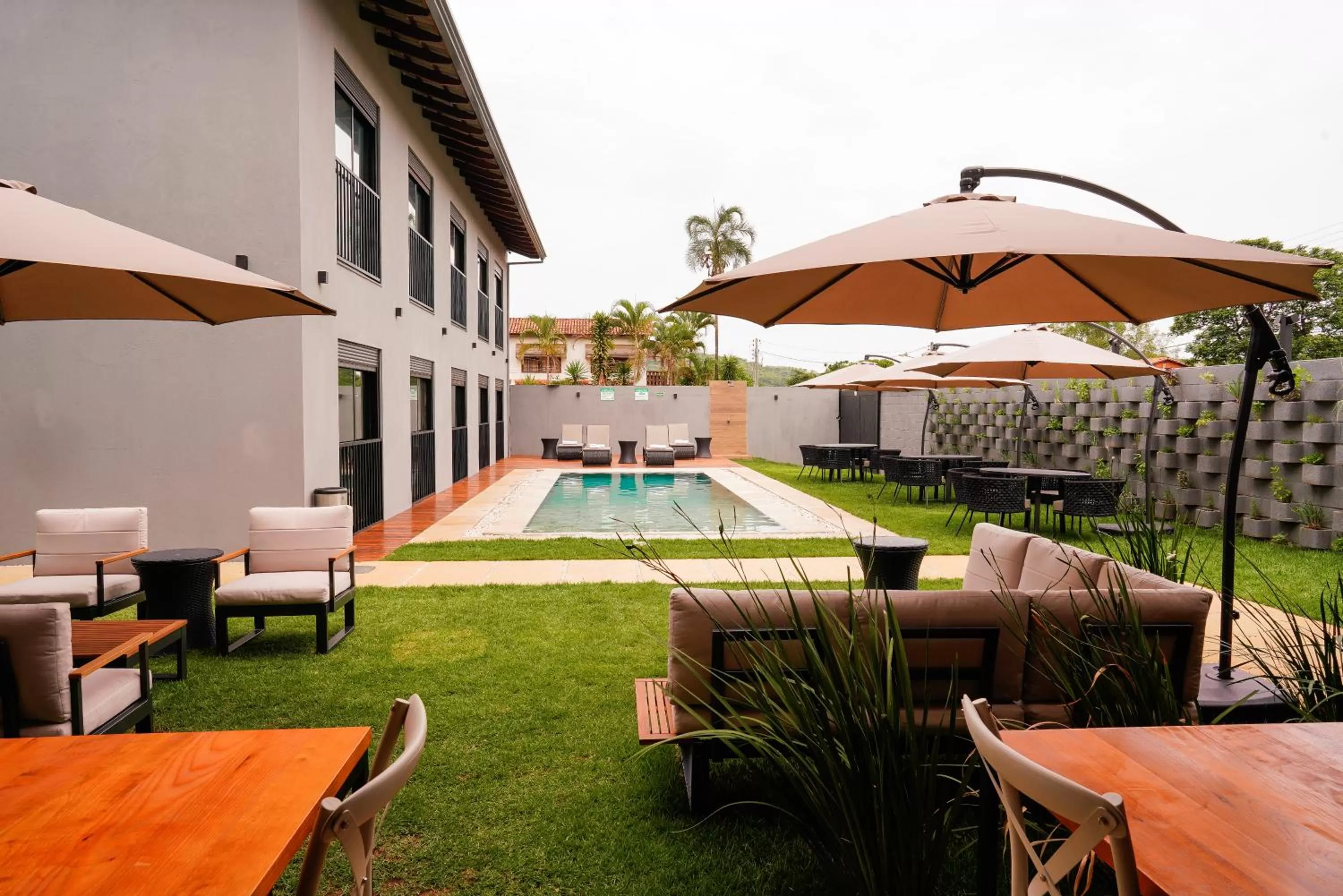 Patio, Swimming Pool in Pousada Flores do Carmo