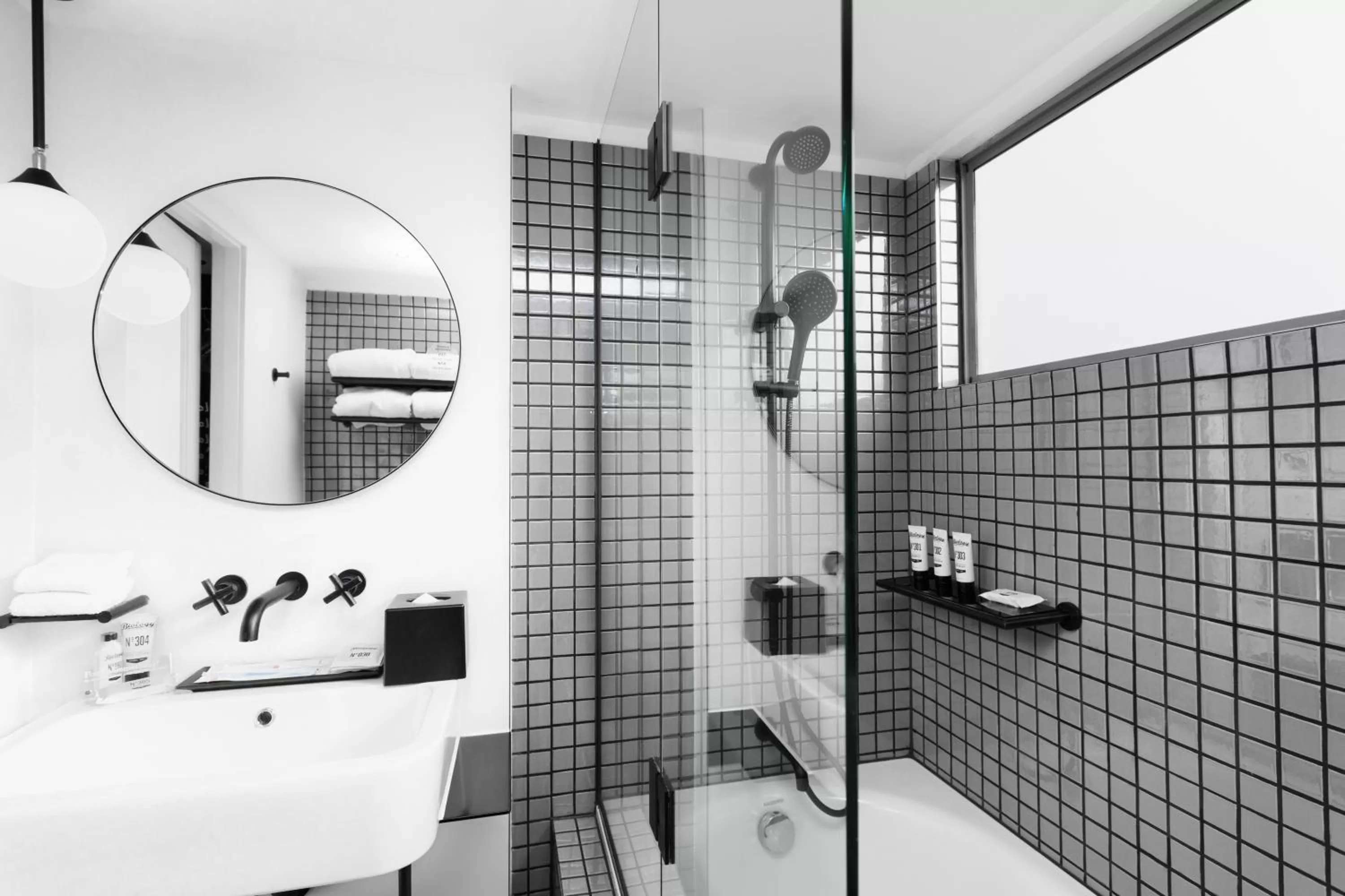 Bathroom in Ovolo Sydney Woolloomooloo, a Wyndham Hotel