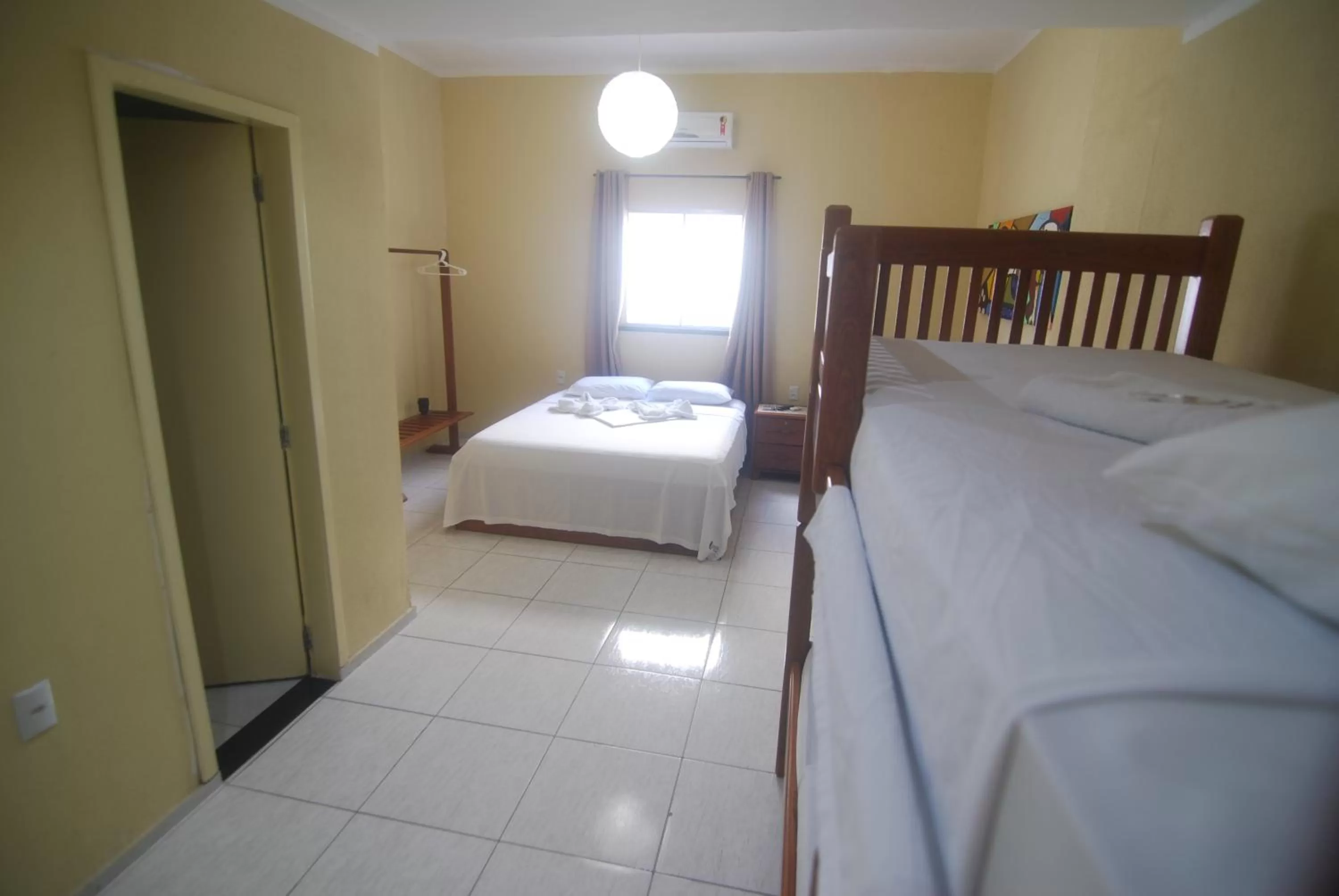 Bed in Refúgio Pousada Fortaleza