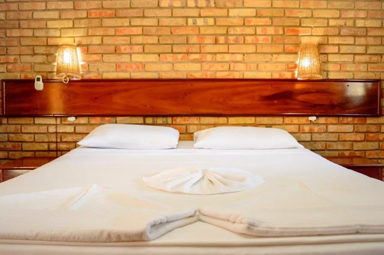 Bed in Hotel Vento Brasil