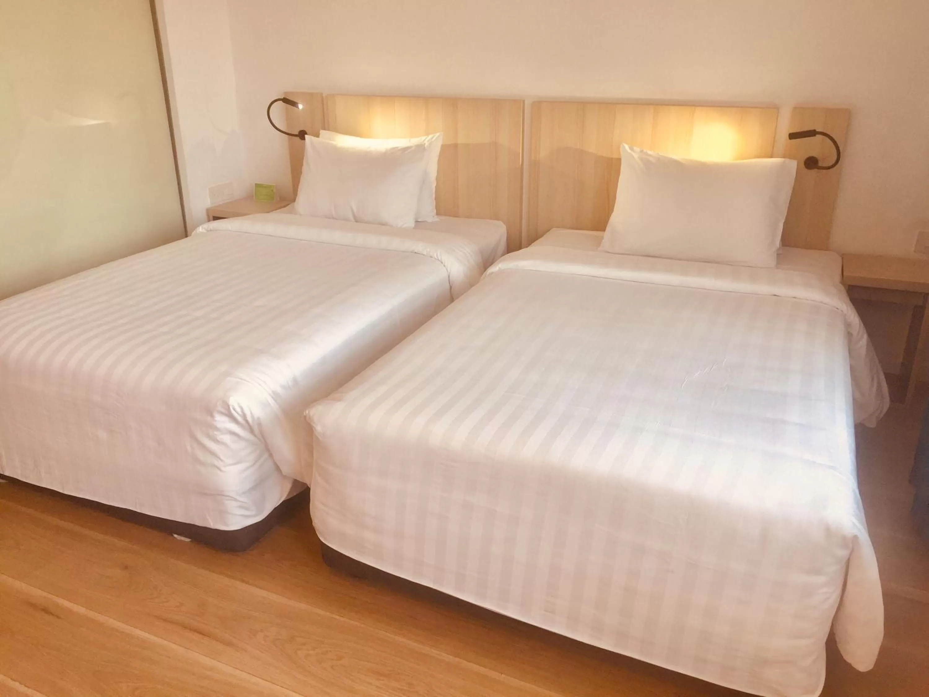 Bed in Liberty Hotel Saigon Greenview