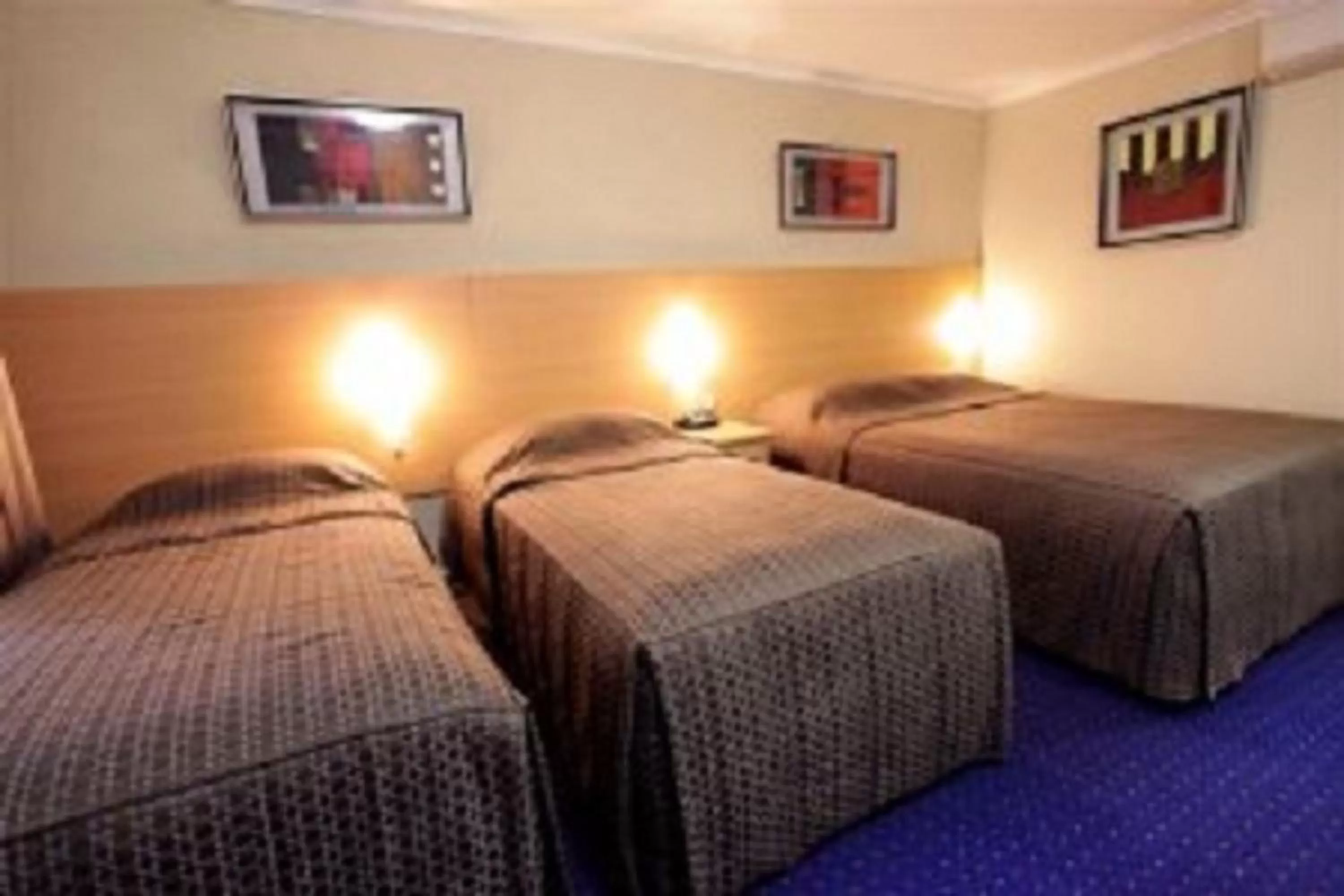 Bedroom, Bed in Cattlemans Country Motor Inn & Serviced Apartments