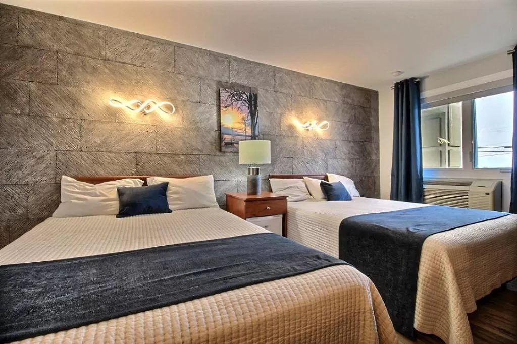 Bed in Hotel Motel Le Quiet