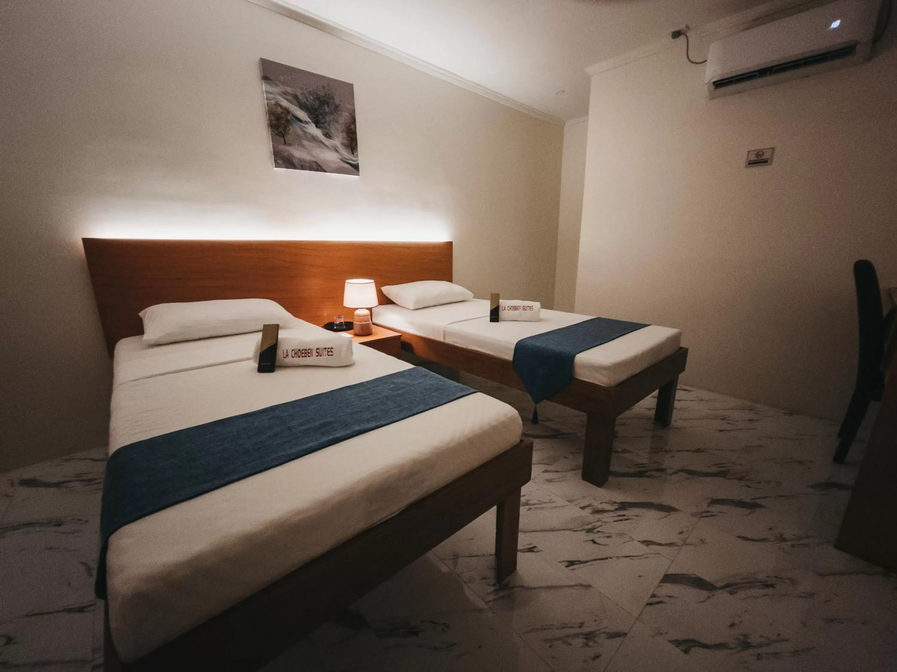 Bed in La Choeben Suites