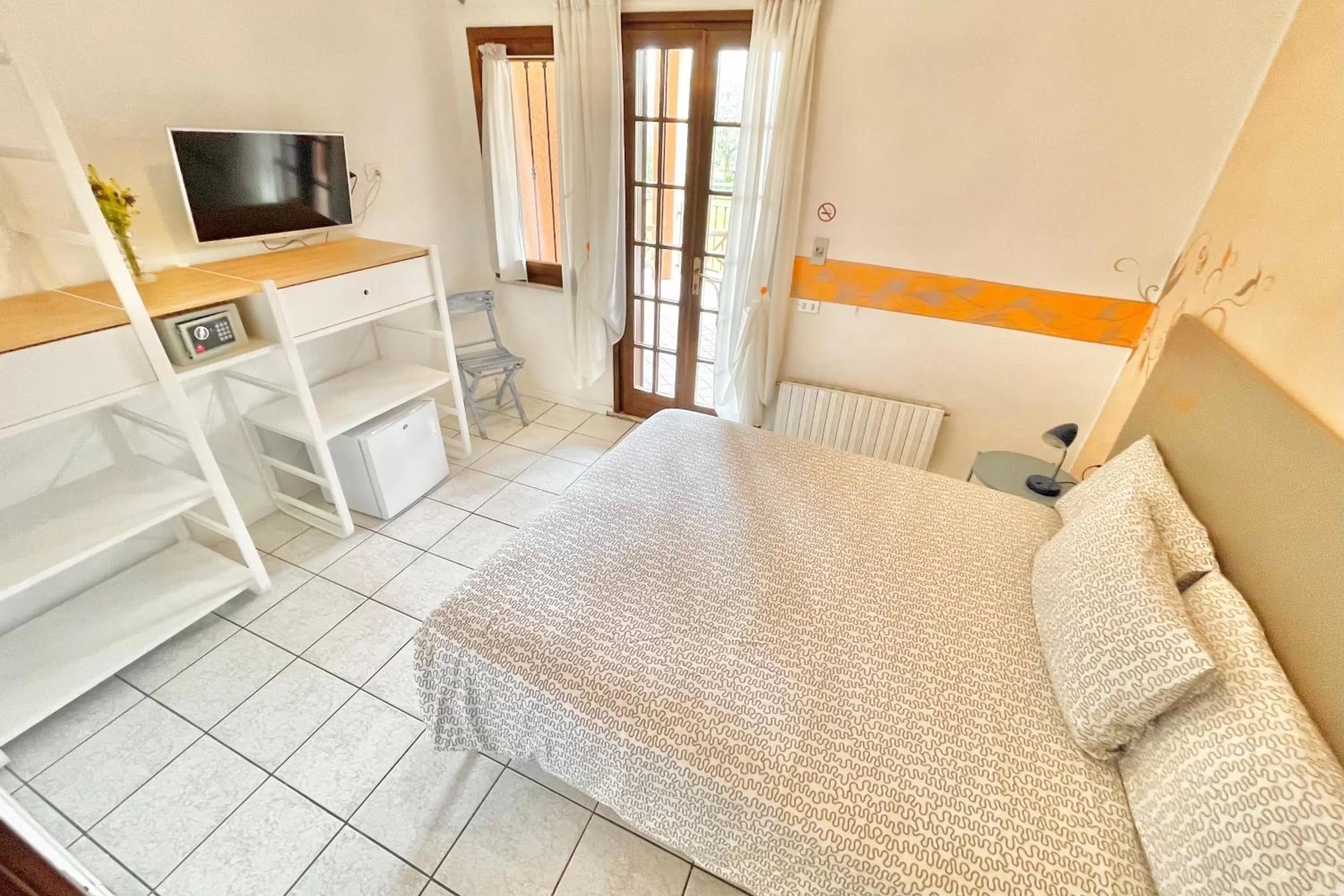 Photo of the whole room, Bed in Albergo Vittoria