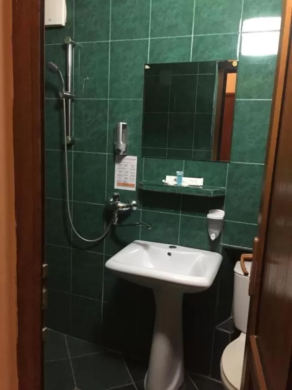 Bathroom in Piano Hotel