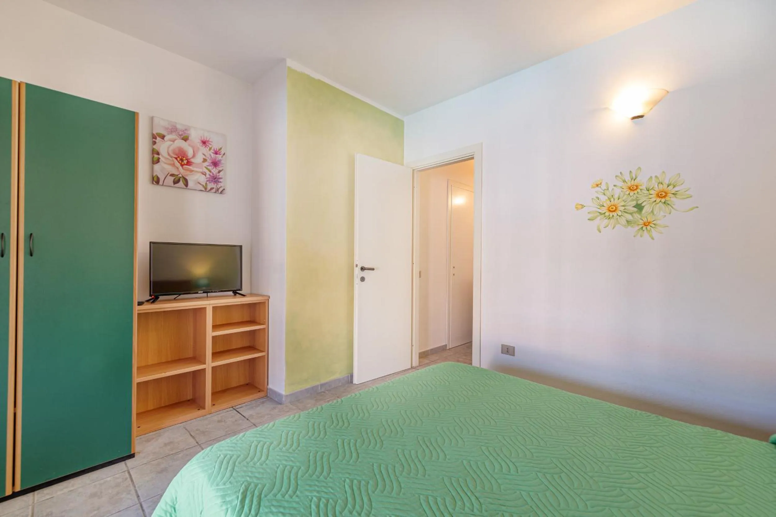 Bed in Marina Manna Hotel and Club Village