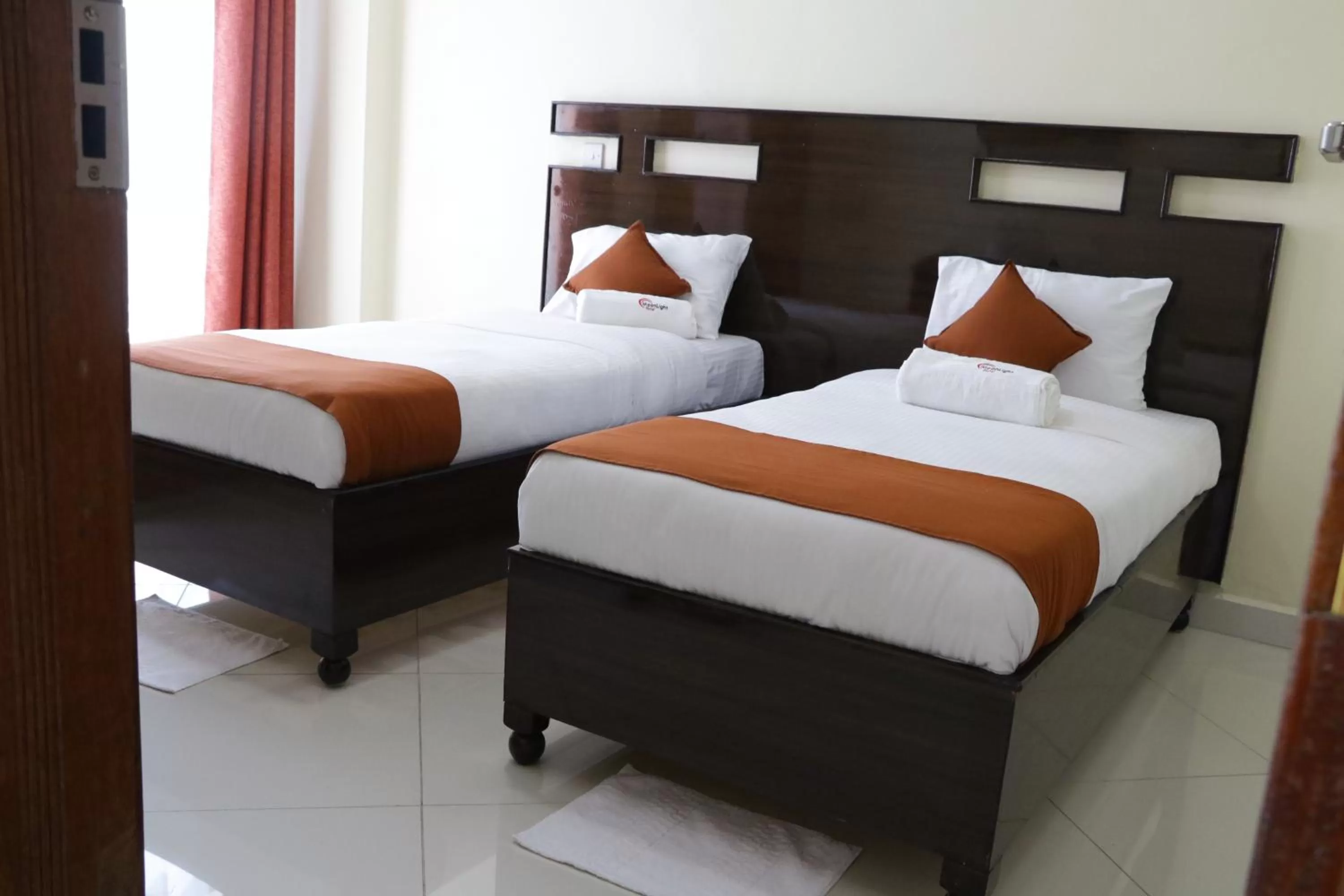 Bed in Claire de Lune Moonlight Hotel