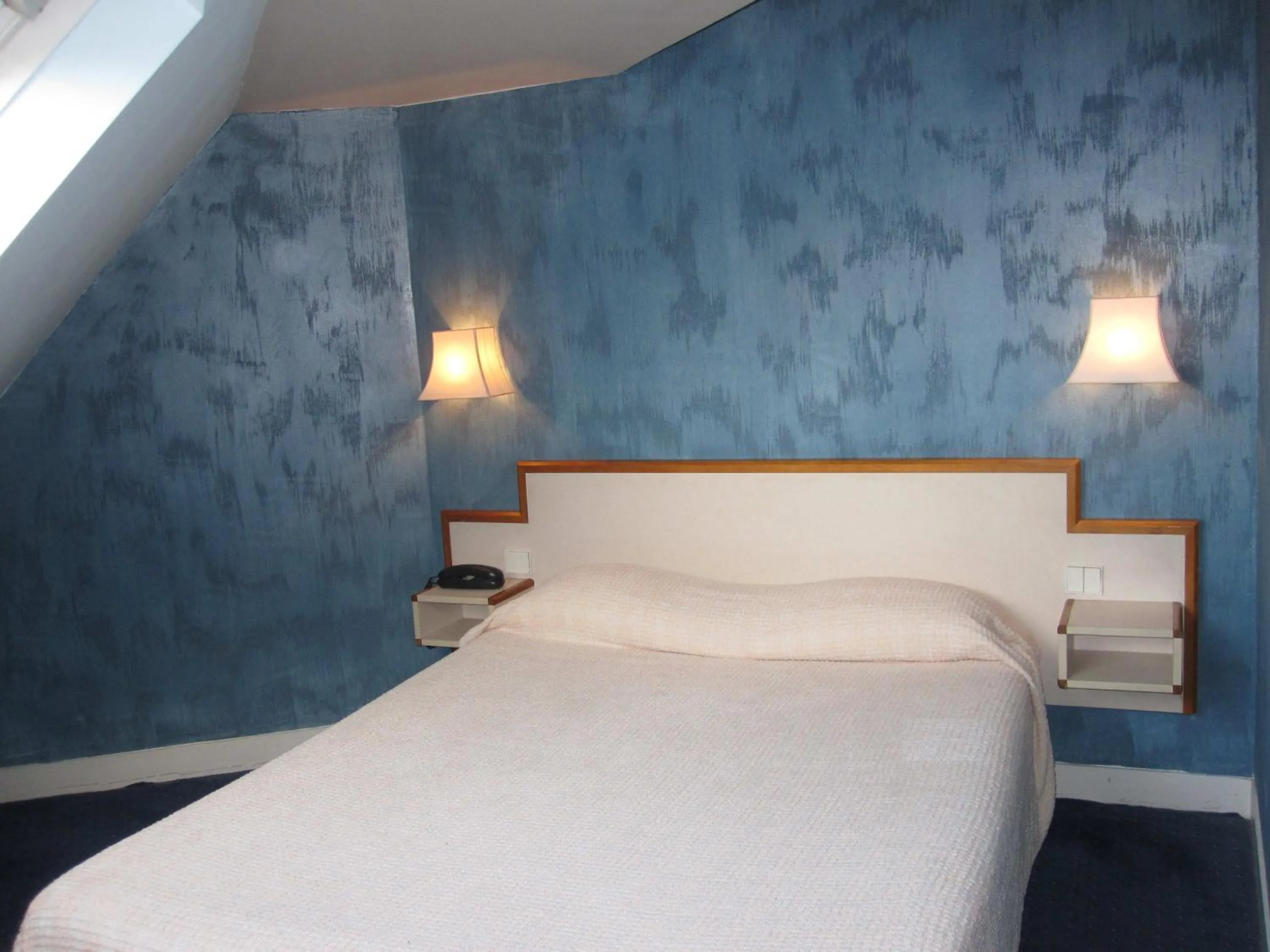 Bed in Hotel Royal Bergère