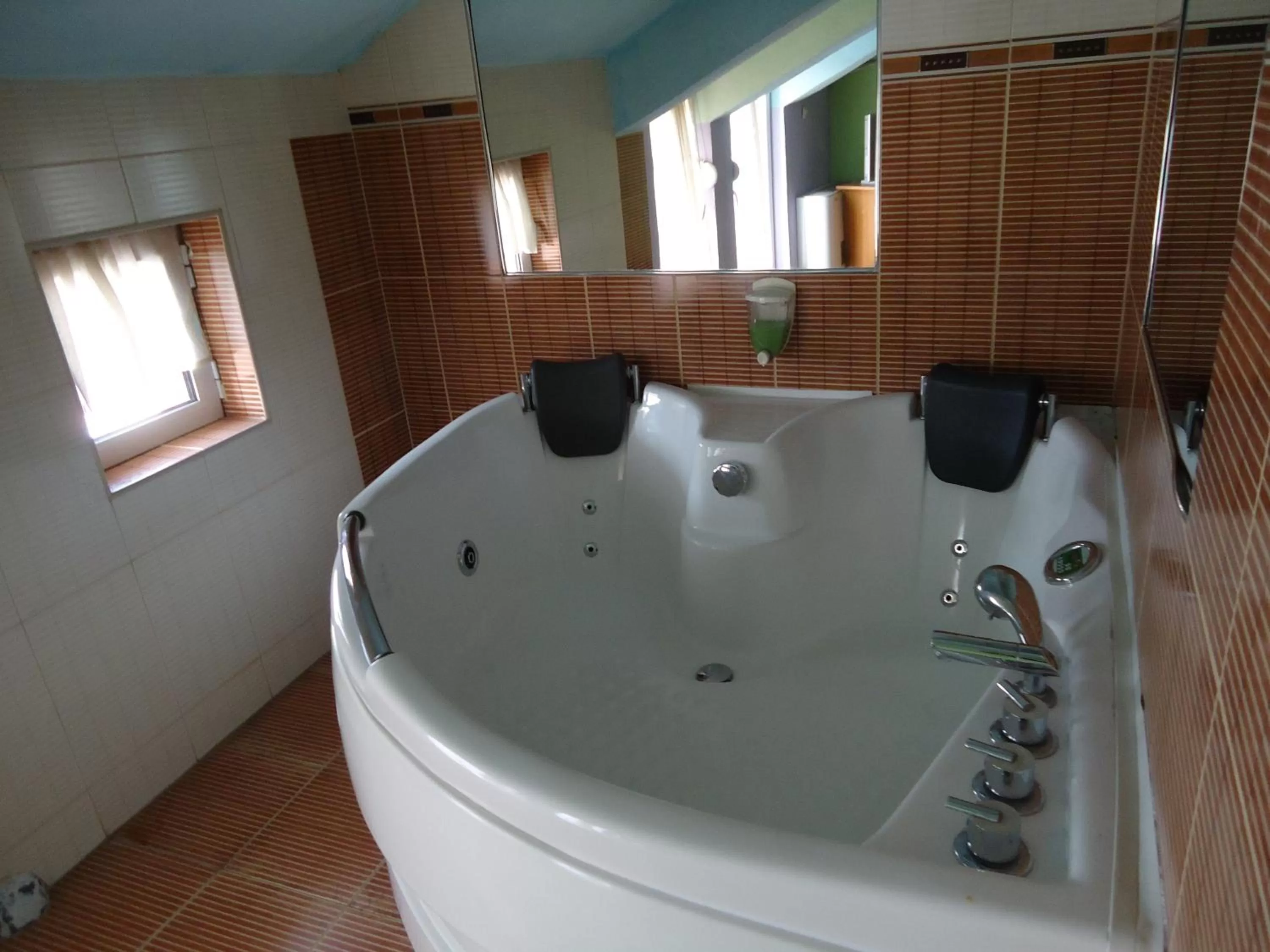 Bathroom in Dionis Hotel