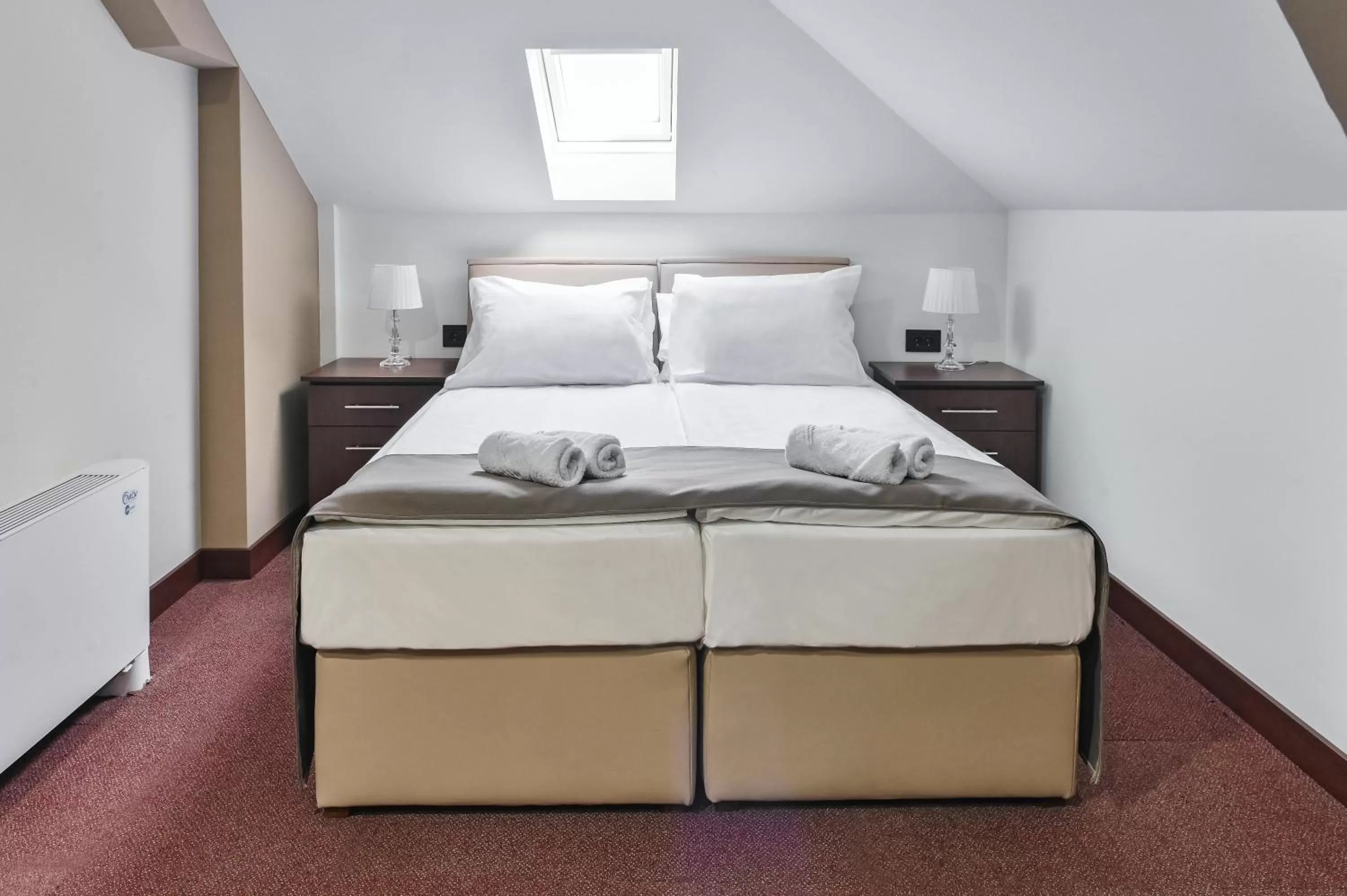 Bed in Garni Hotel Aline