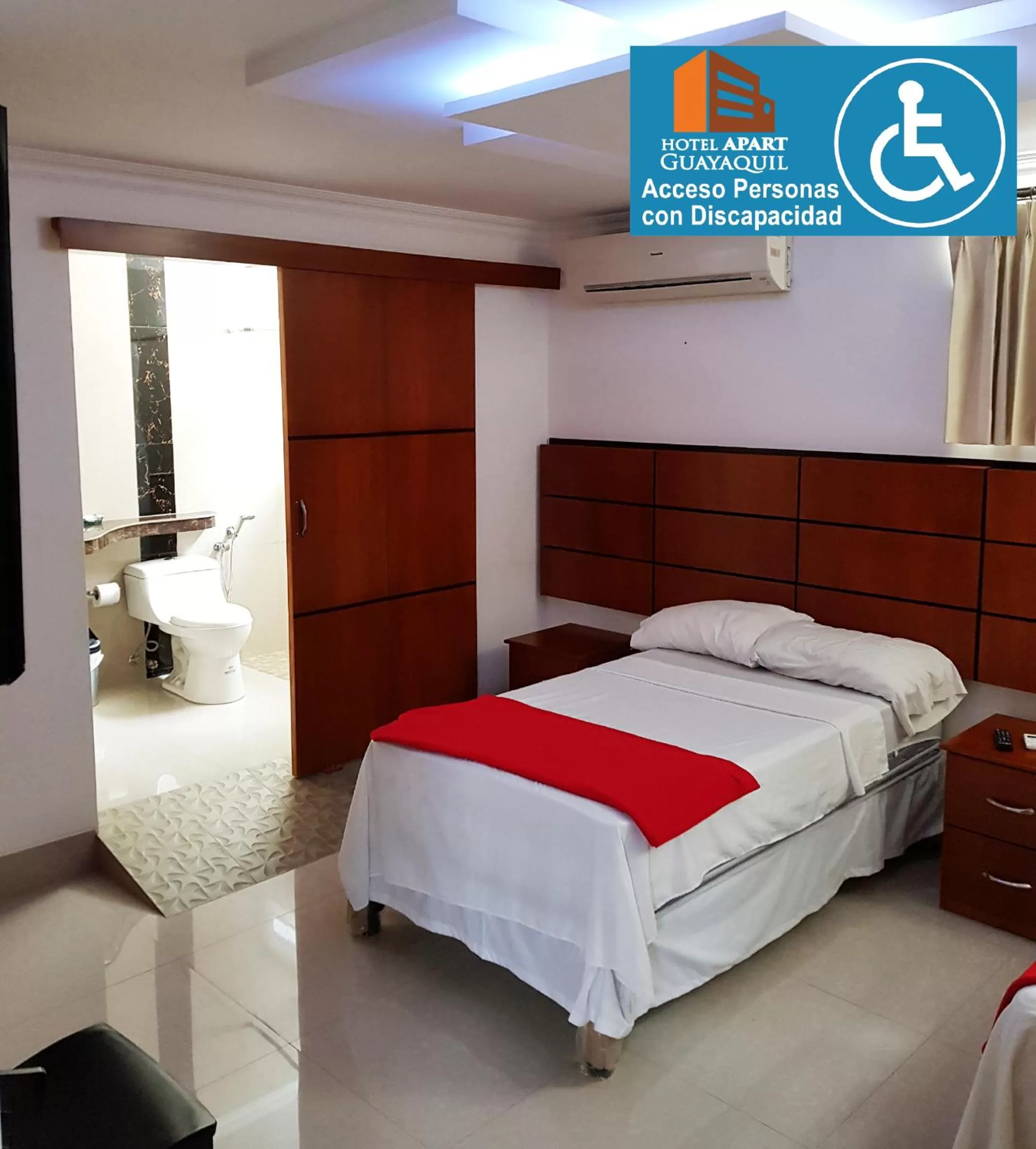 Facility for disabled guests, Bed in Hotel Apart Guayaquil Aeropuerto