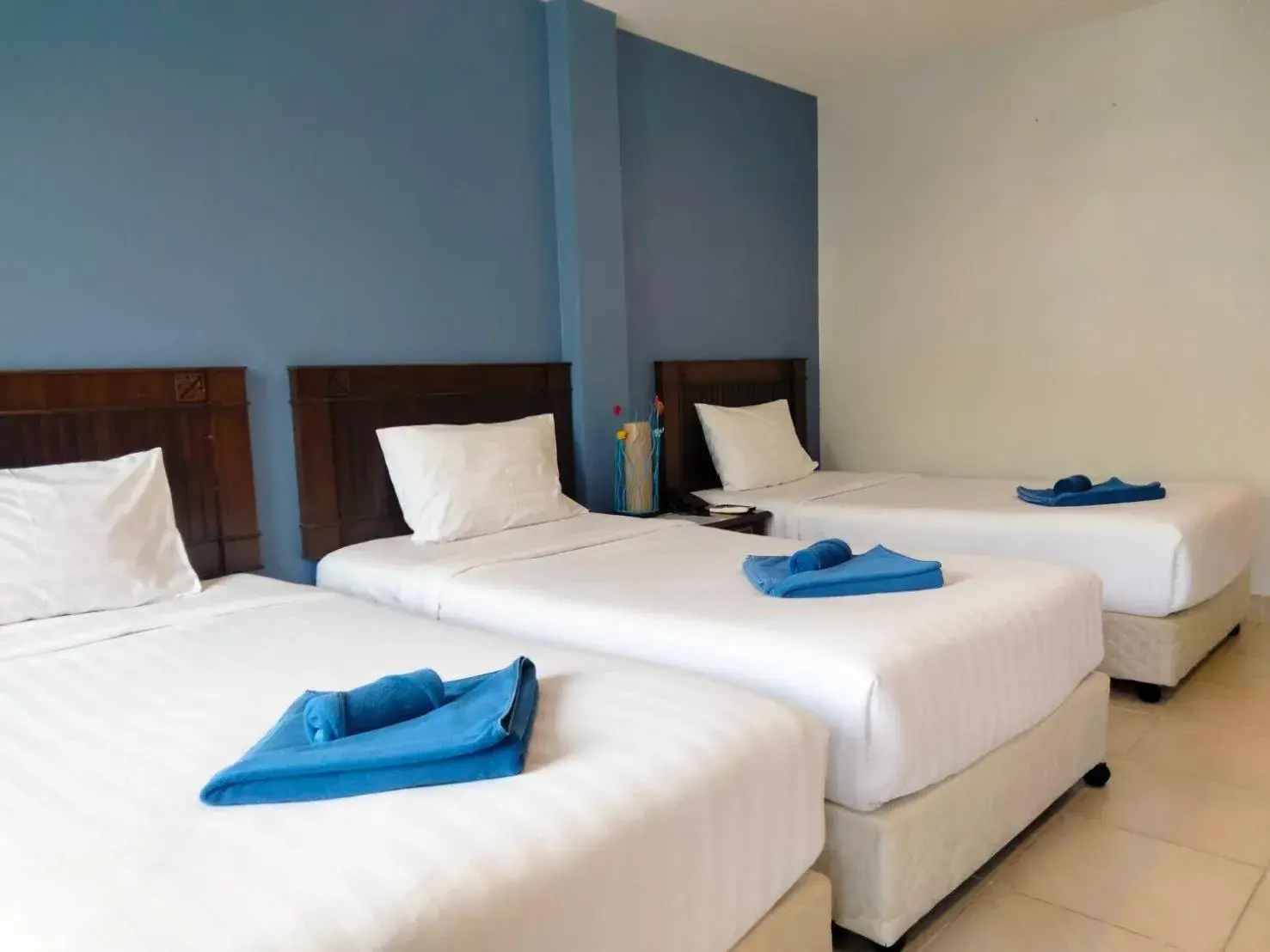 Basic Triple Room in Karon Living Room - SHA Plus Basic Triple Room in Karon Living Room - SHA Plus