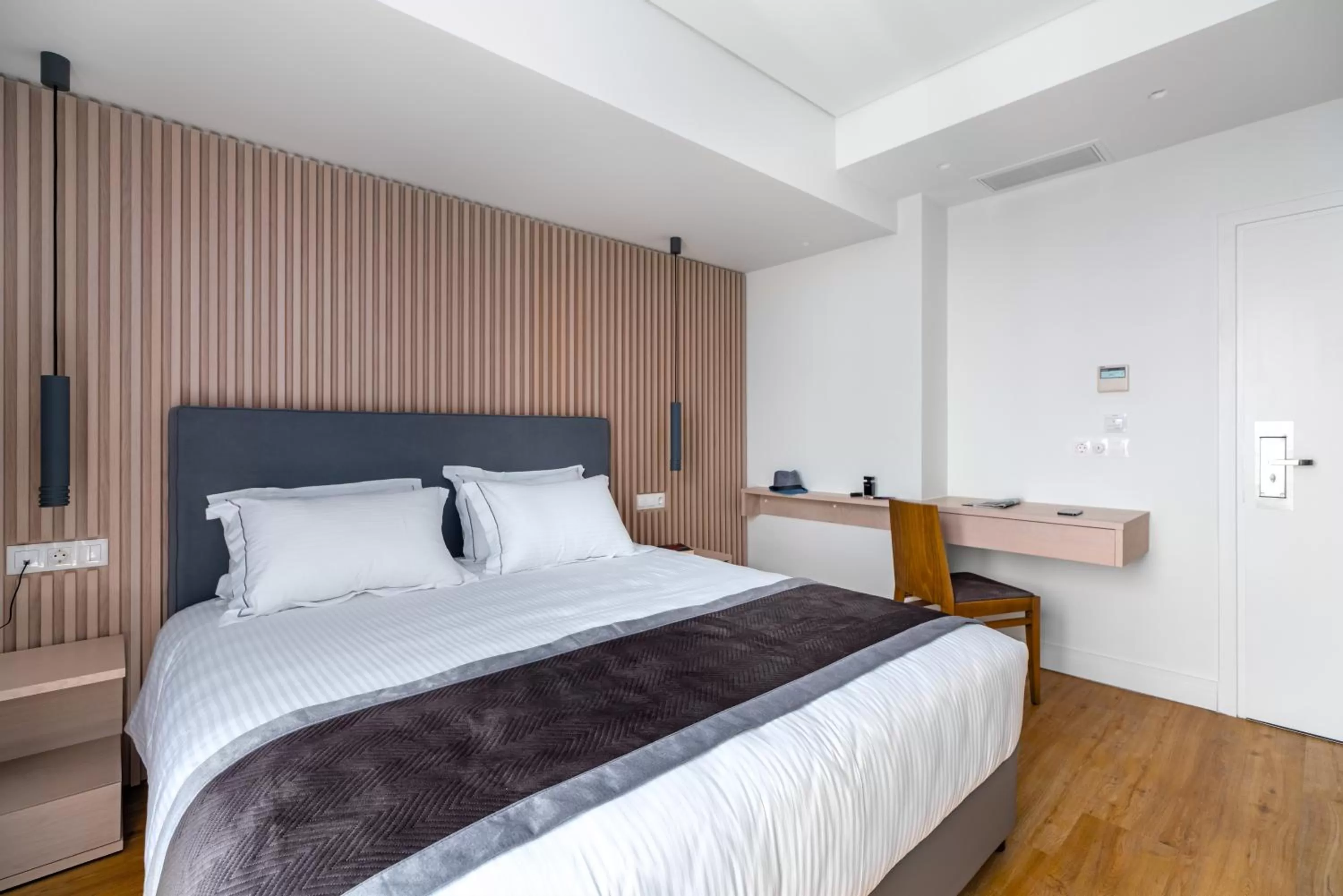 Bed in Glyfada Riviera Hotel