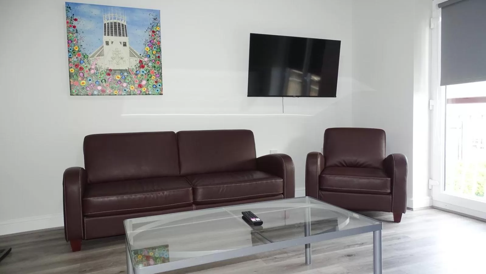 TV and multimedia in Cocoon @ International Inn + Apartments