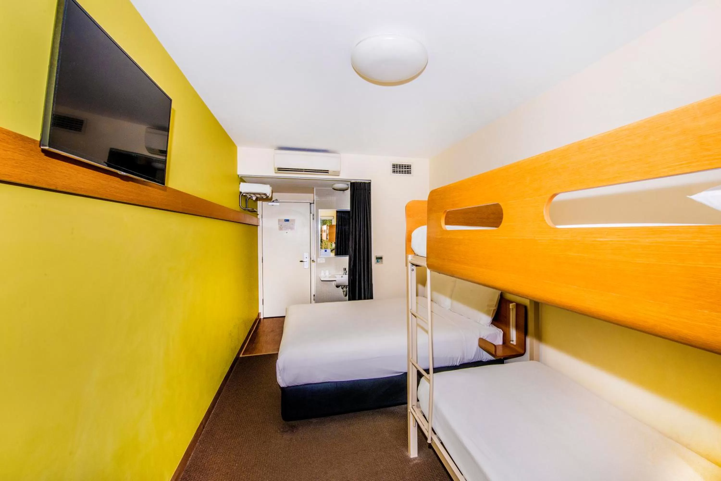 Photo of the whole room, Bed in ibis Budget Sydney Olympic Park
