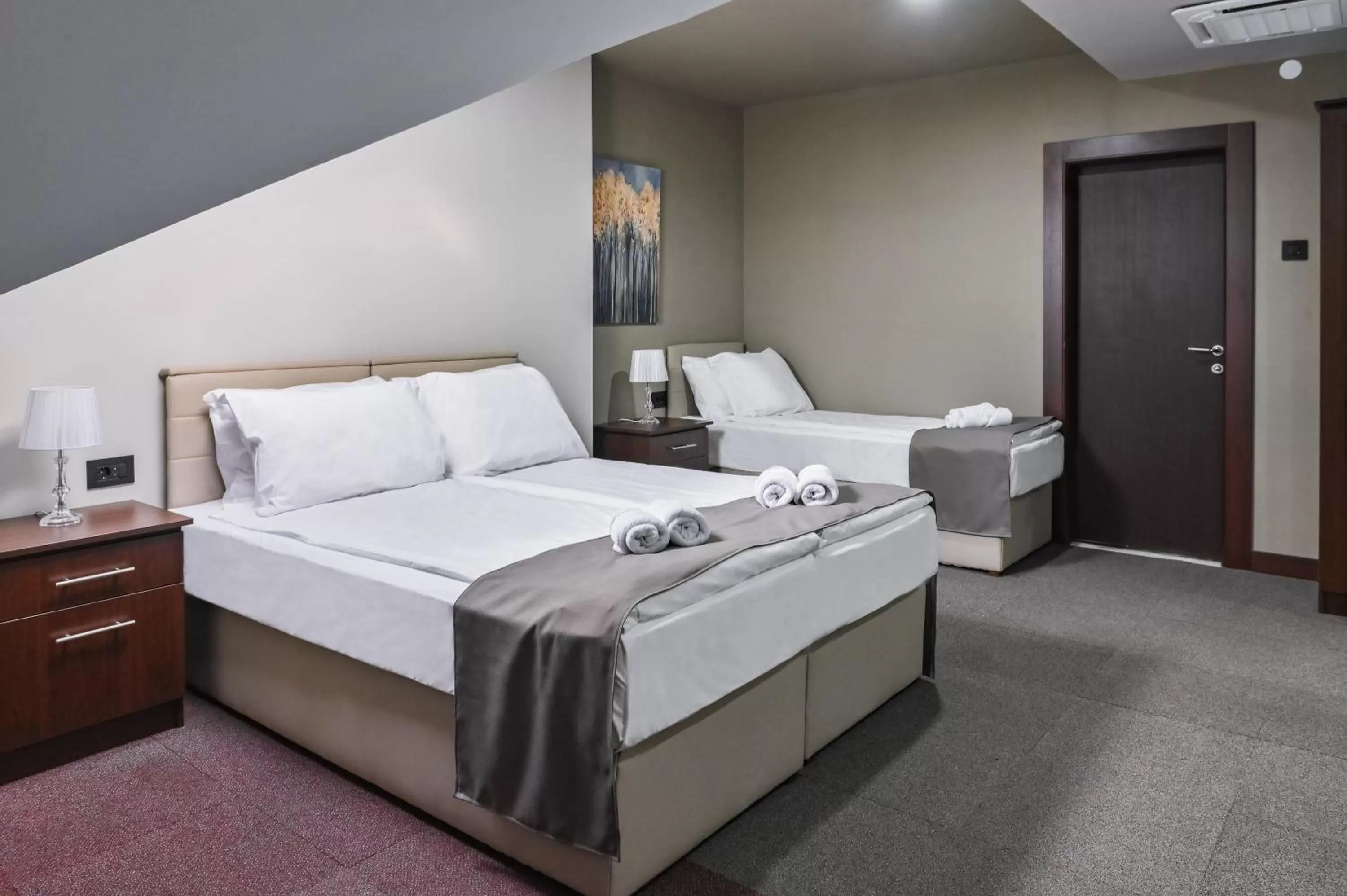 Bed in Garni Hotel Aline