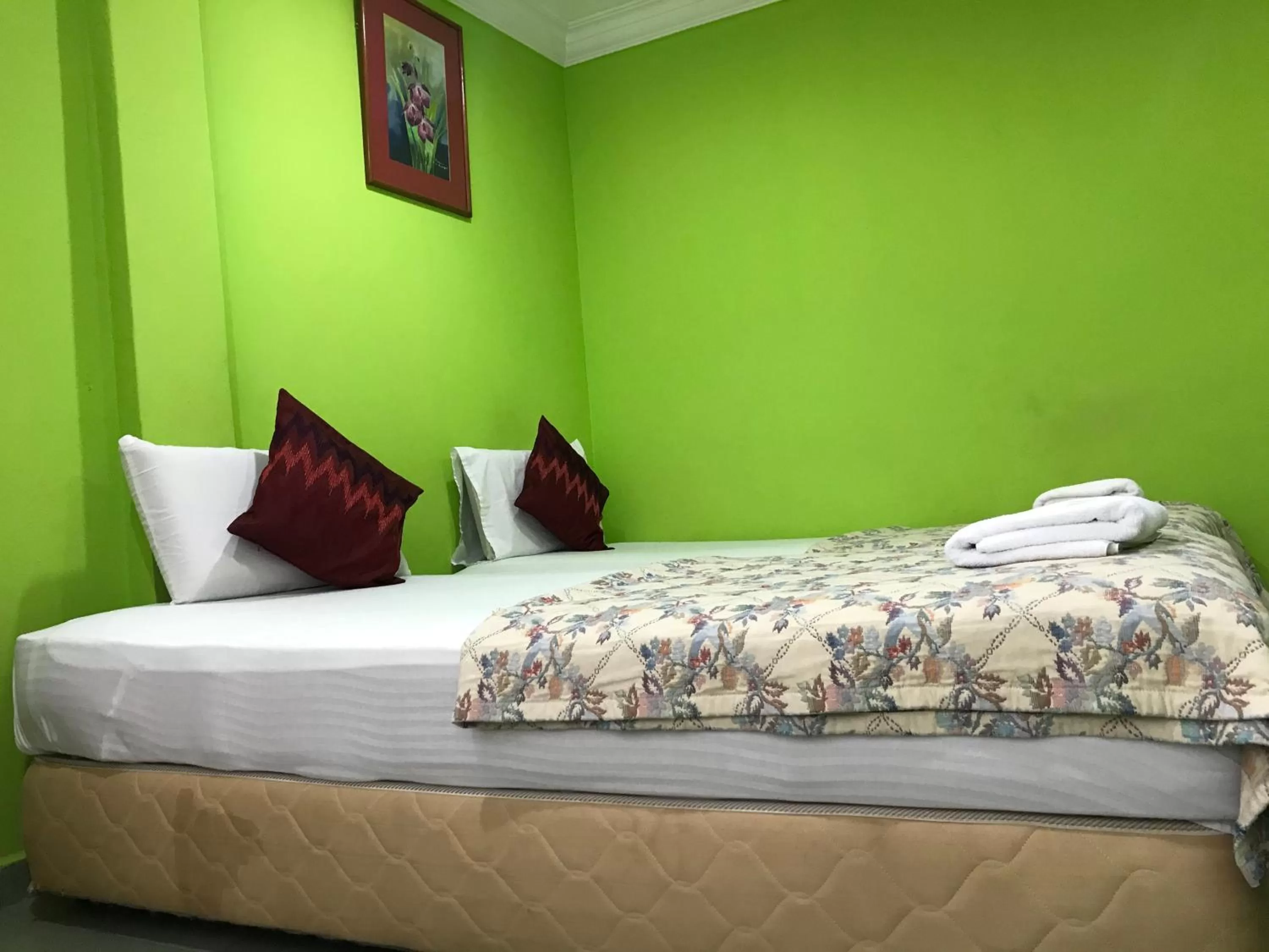 Bed in Hotel Cahaya