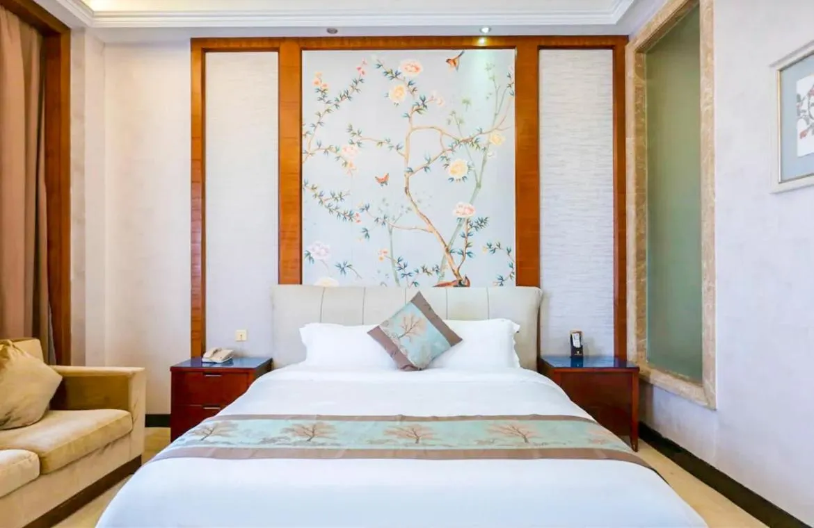 Bedroom in Guangzhou Nuomo International Hotel-Canton Fair Free Shuttle Bus