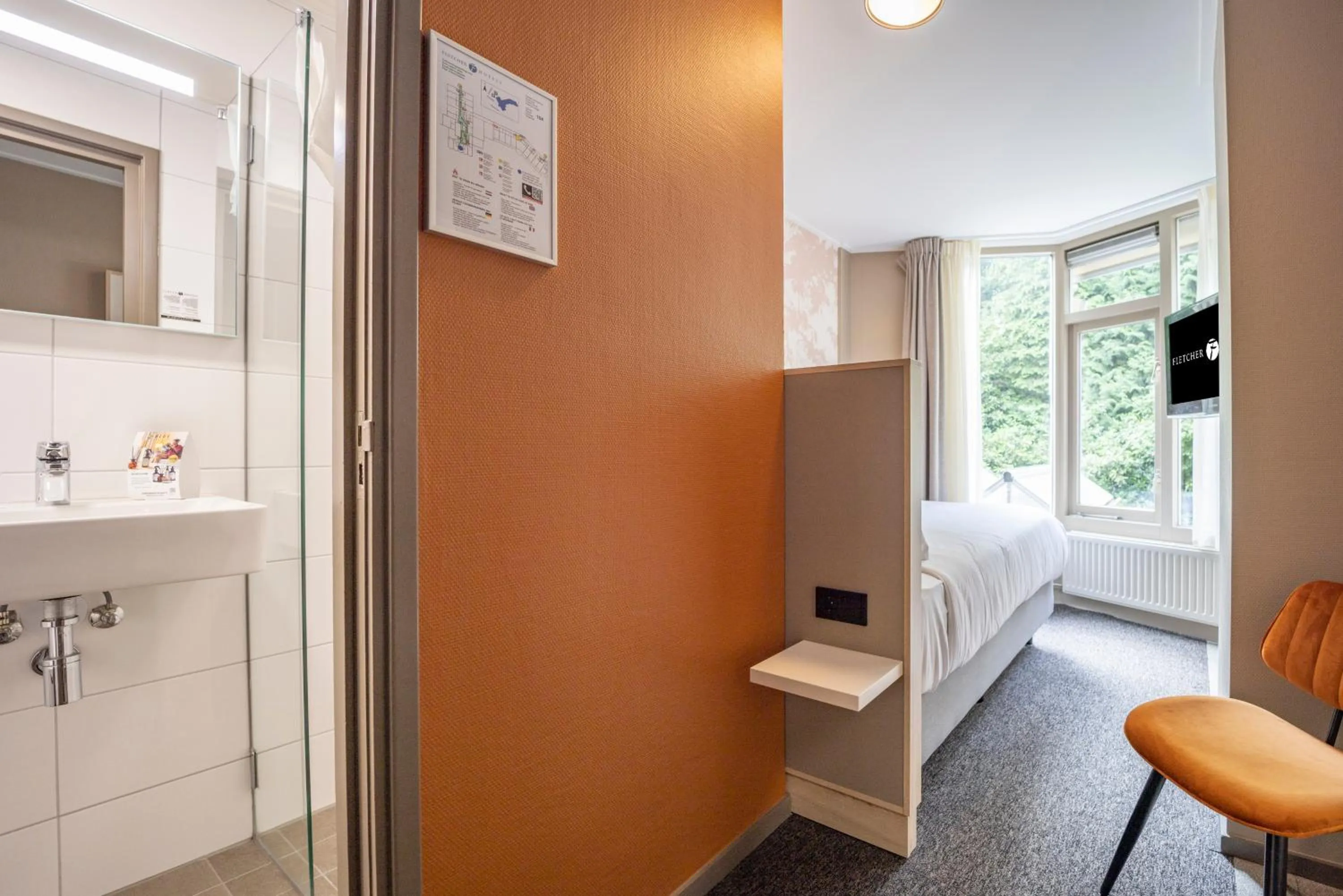 Bedroom in Fletcher Hotel-Restaurant De Scheperskamp