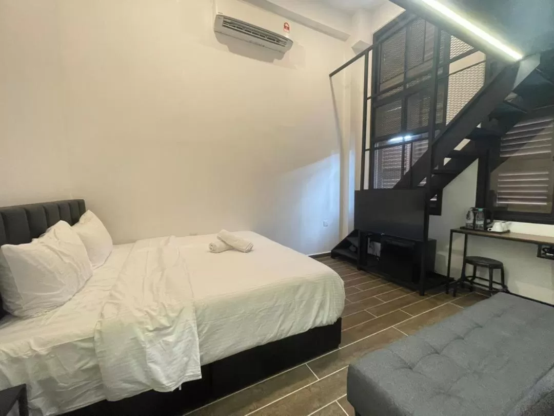 Bed in The Magazine Boutique Hotel