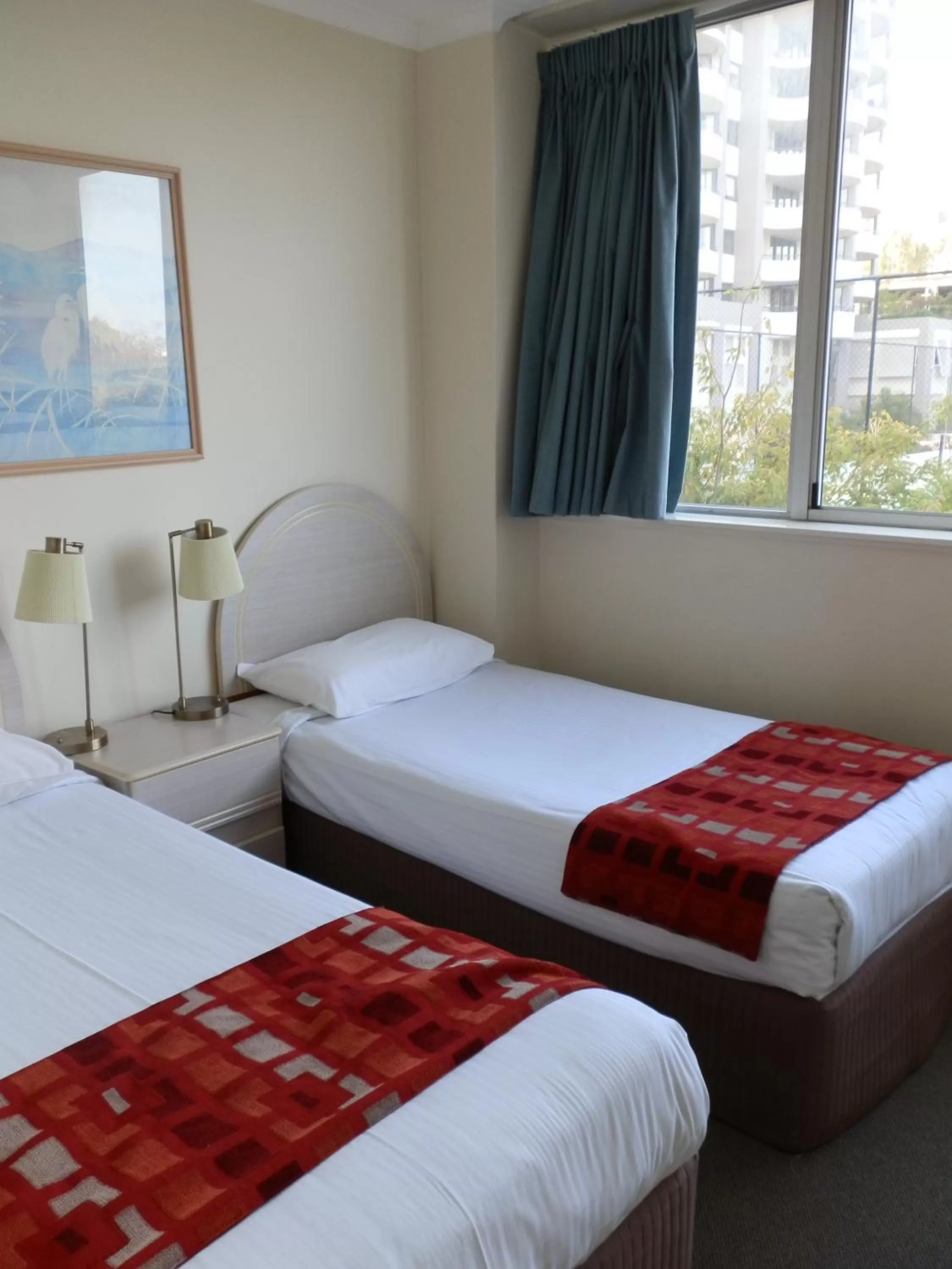 Bed in Chasely Apartment Hotel