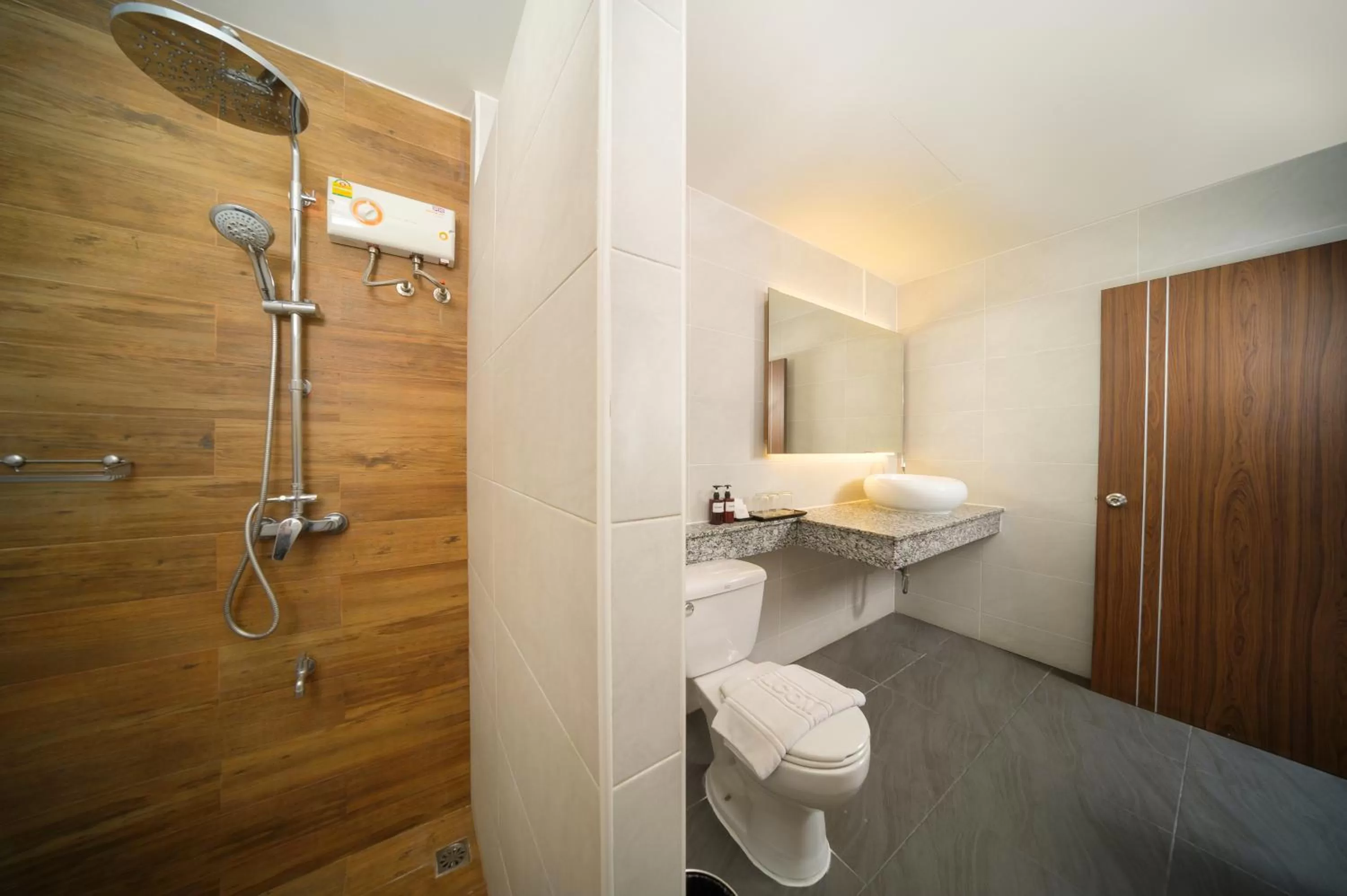 Bathroom in The Wing Lanna Hotel