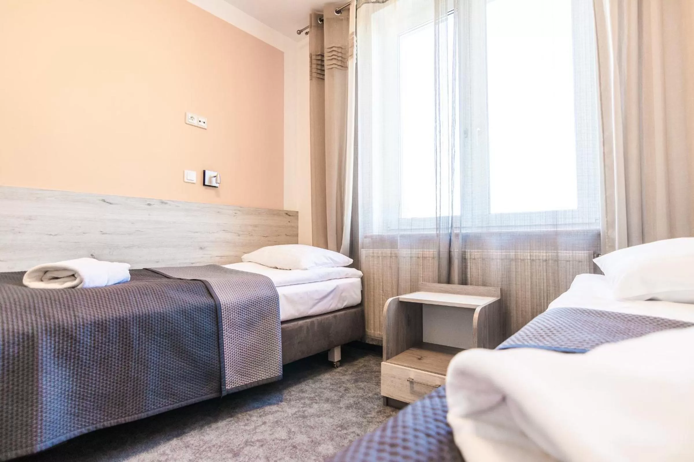 Photo of the whole room, Bed in Resident Rene