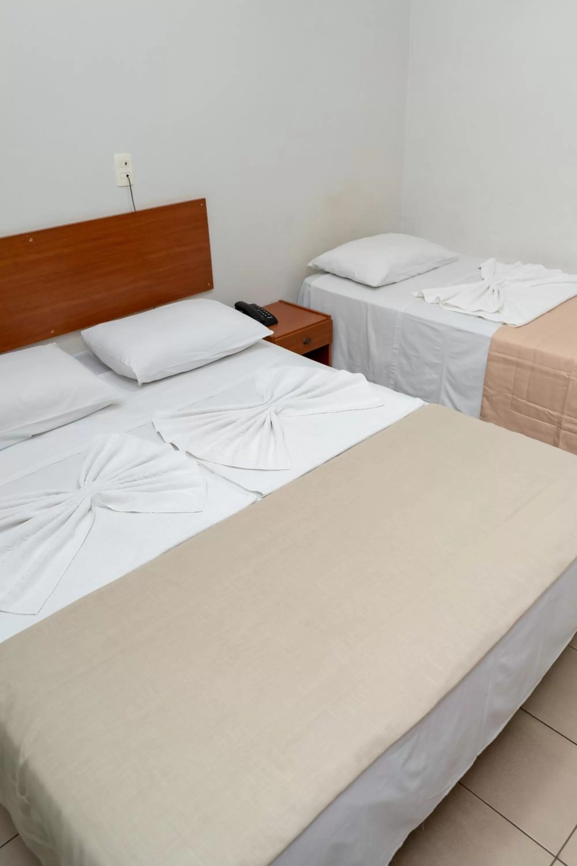 Bed in Bandeirantes Hotel