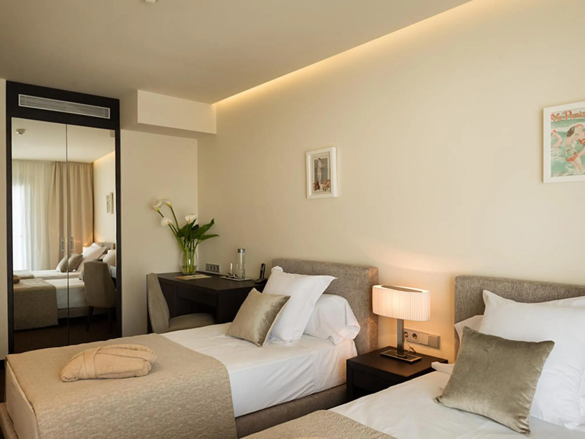 Bed in Cosmopolita Hotel Boutique & Spa