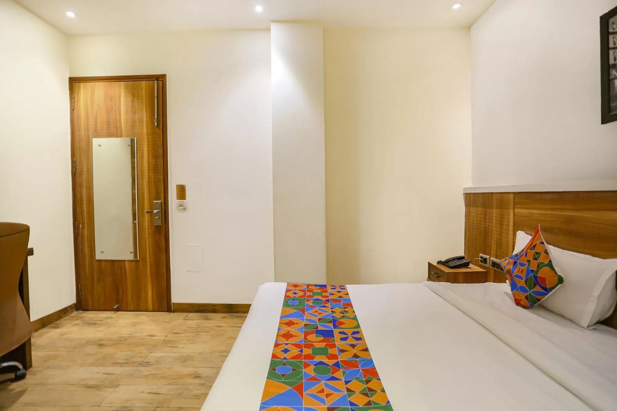 Bed in FabHotel Royal Touch Patel Nagar