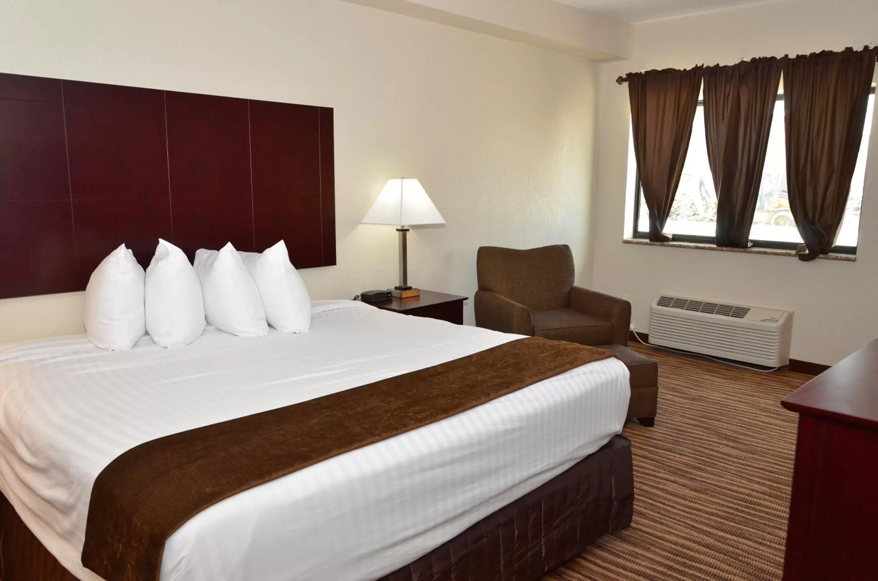 Bed in Cobblestone Inn & Suites - Clarion