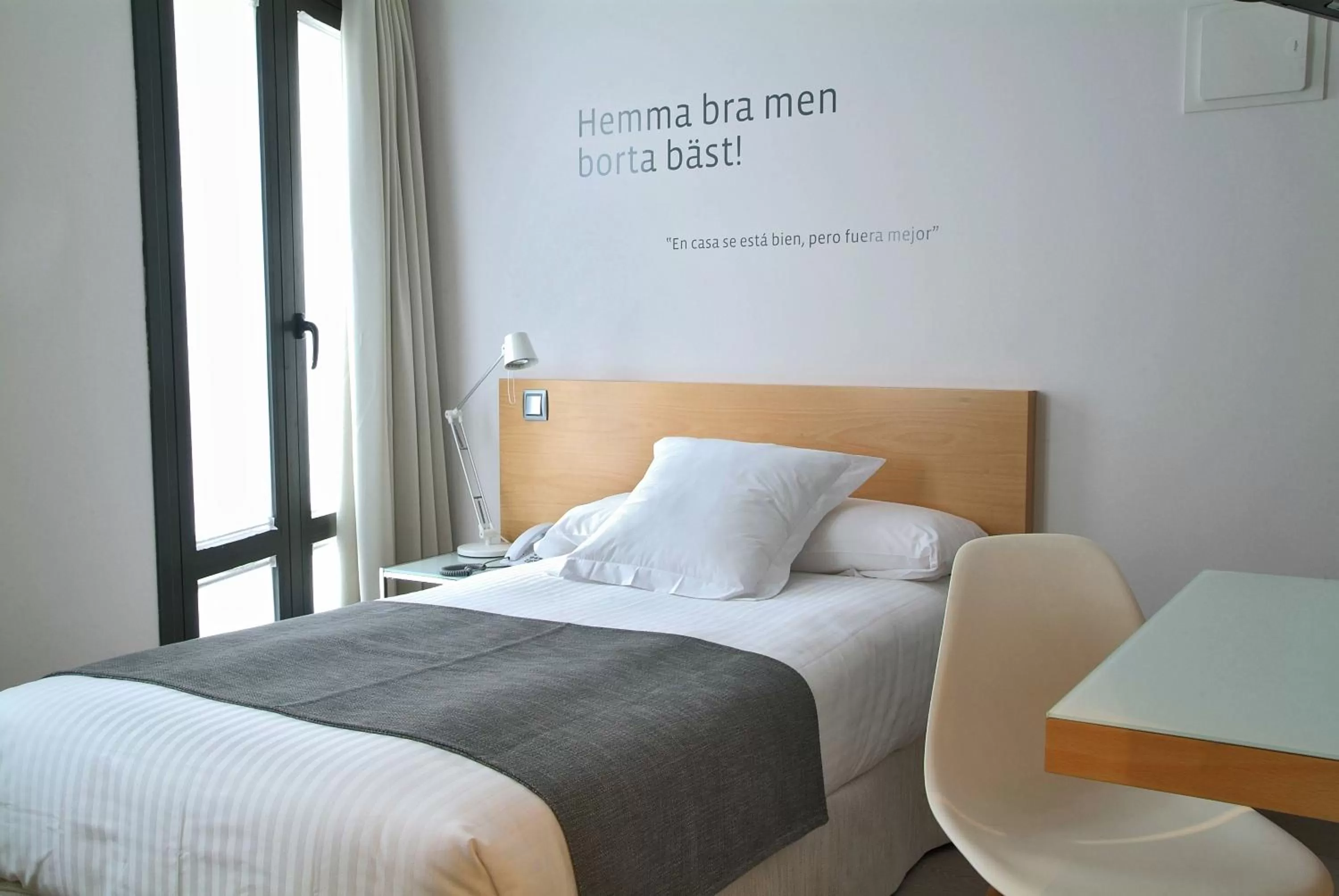 Bed in Le Petit Boutique Hotel