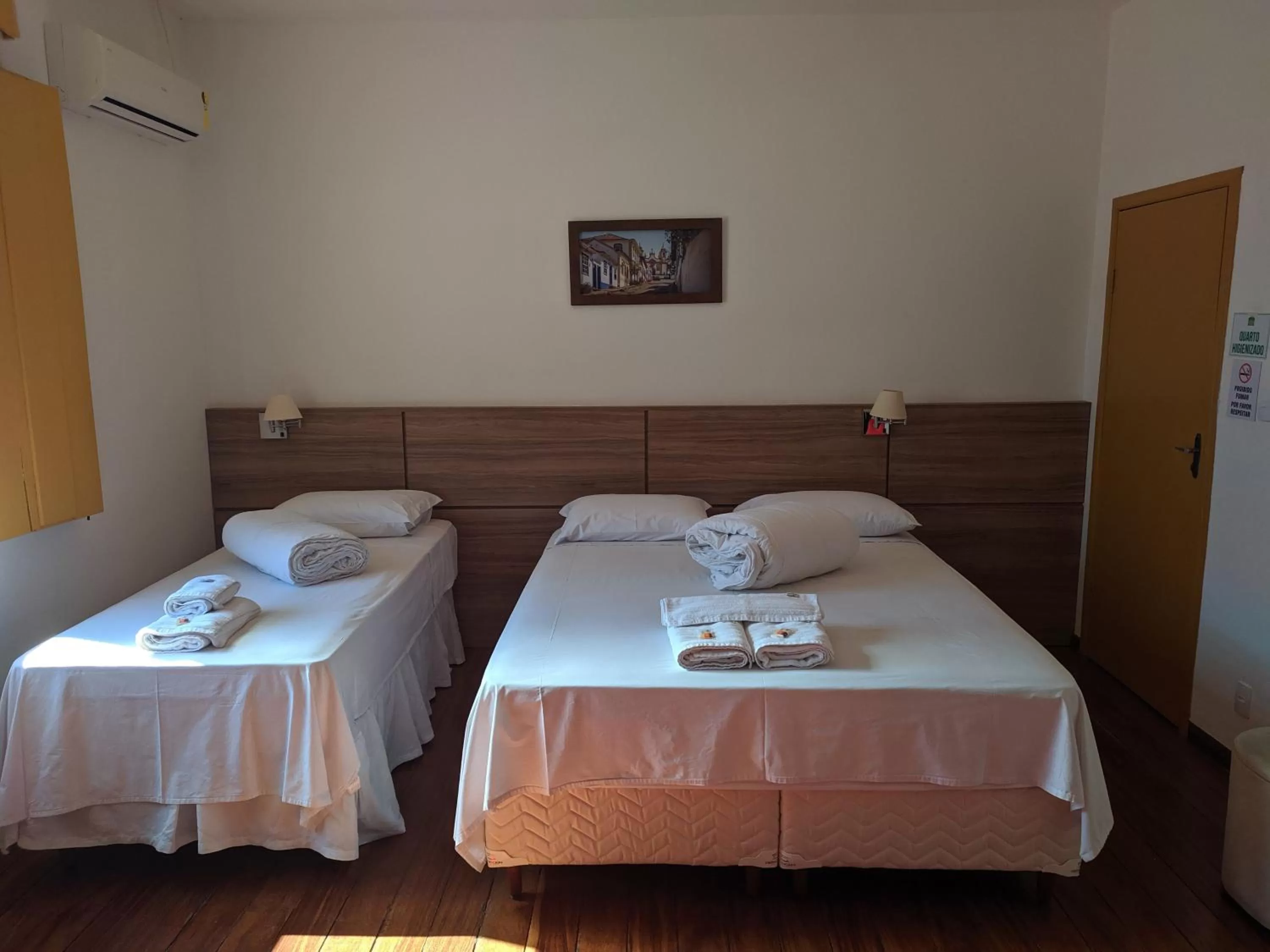 Bed in Pousada o Amanhecer