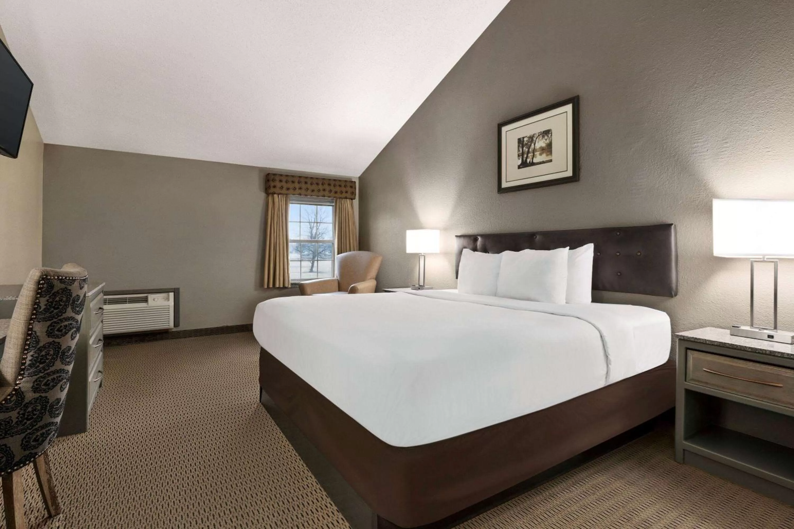 Photo of the whole room, Bed in Travelodge by Wyndham Coffeyville
