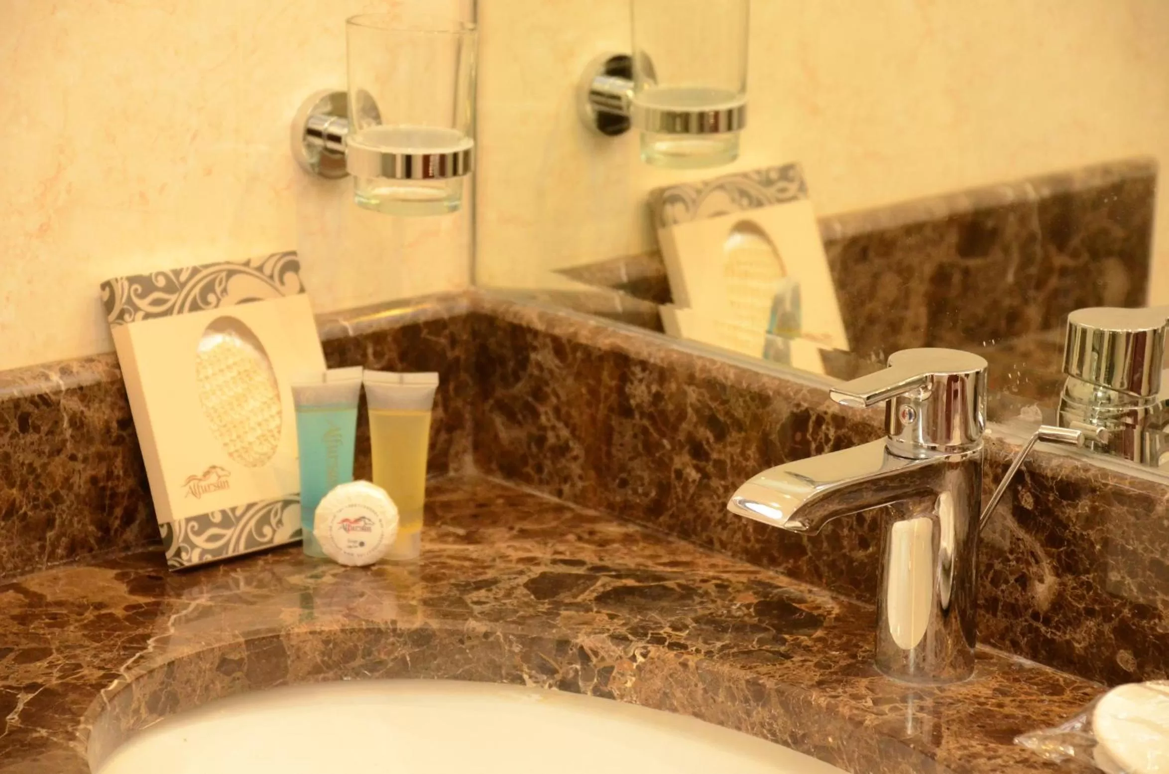 On site, Bathroom in Abat Suites