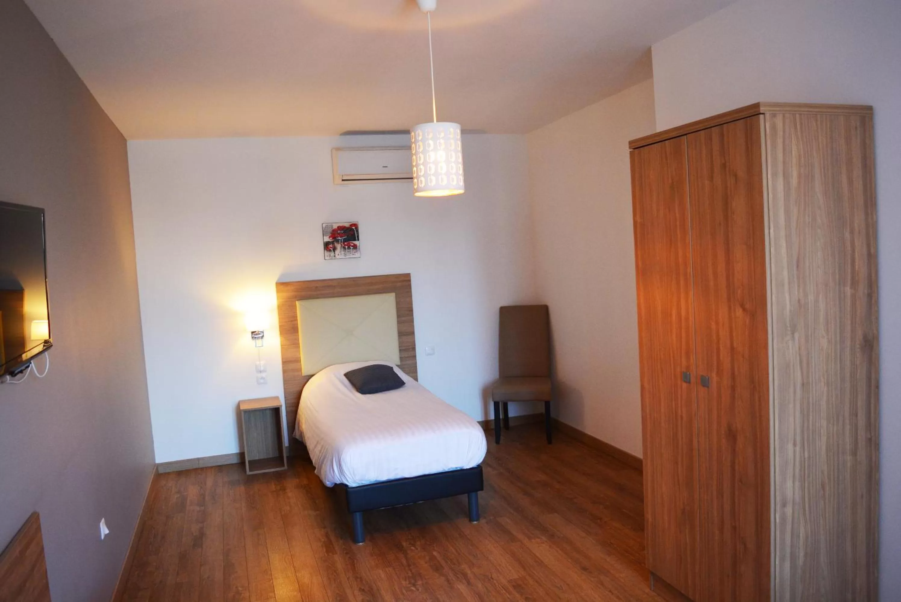 Bed in Le Grand Hôtel Molière