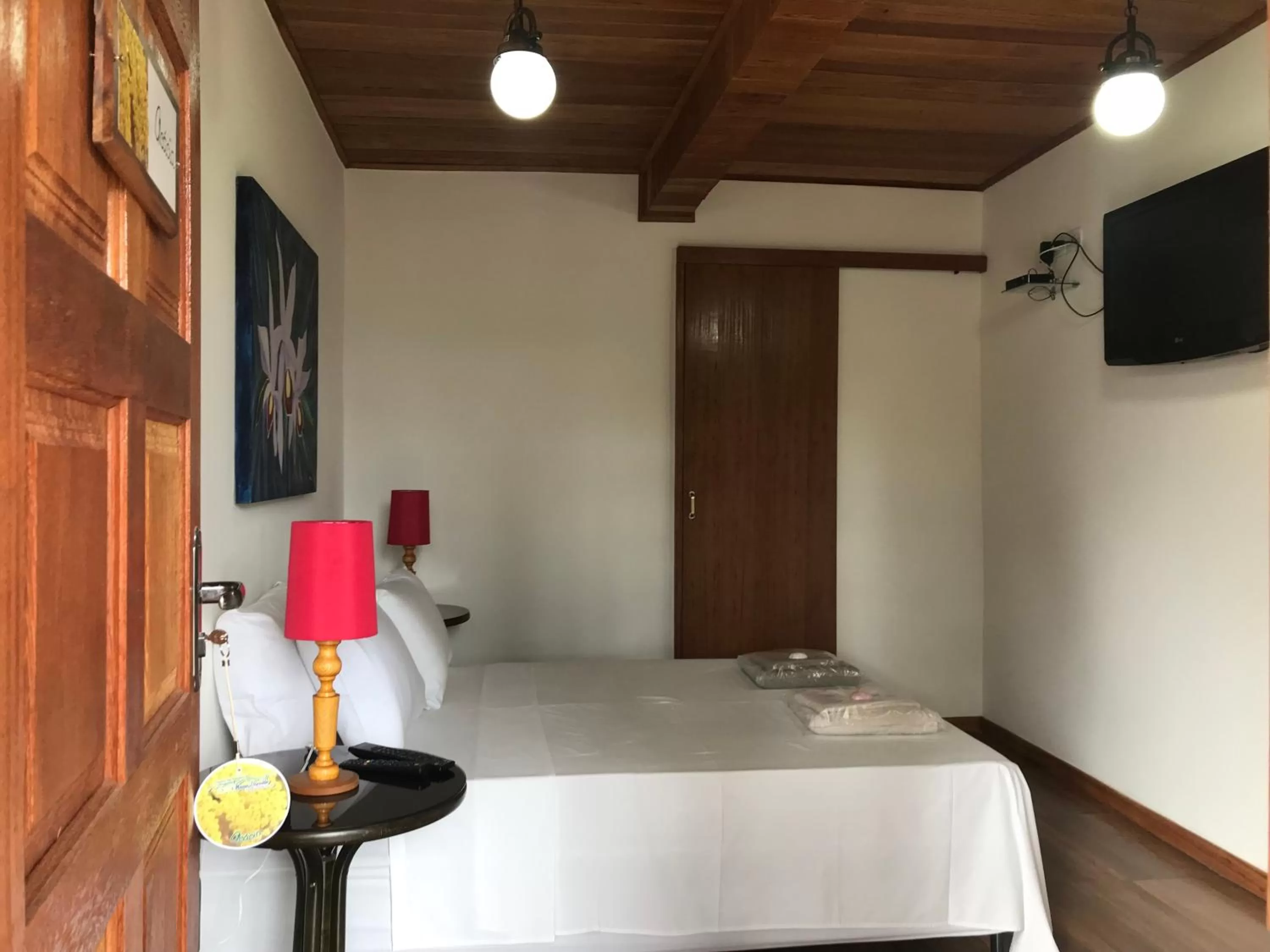 Bed in Pousada R.N.C. Nosso Paraíso