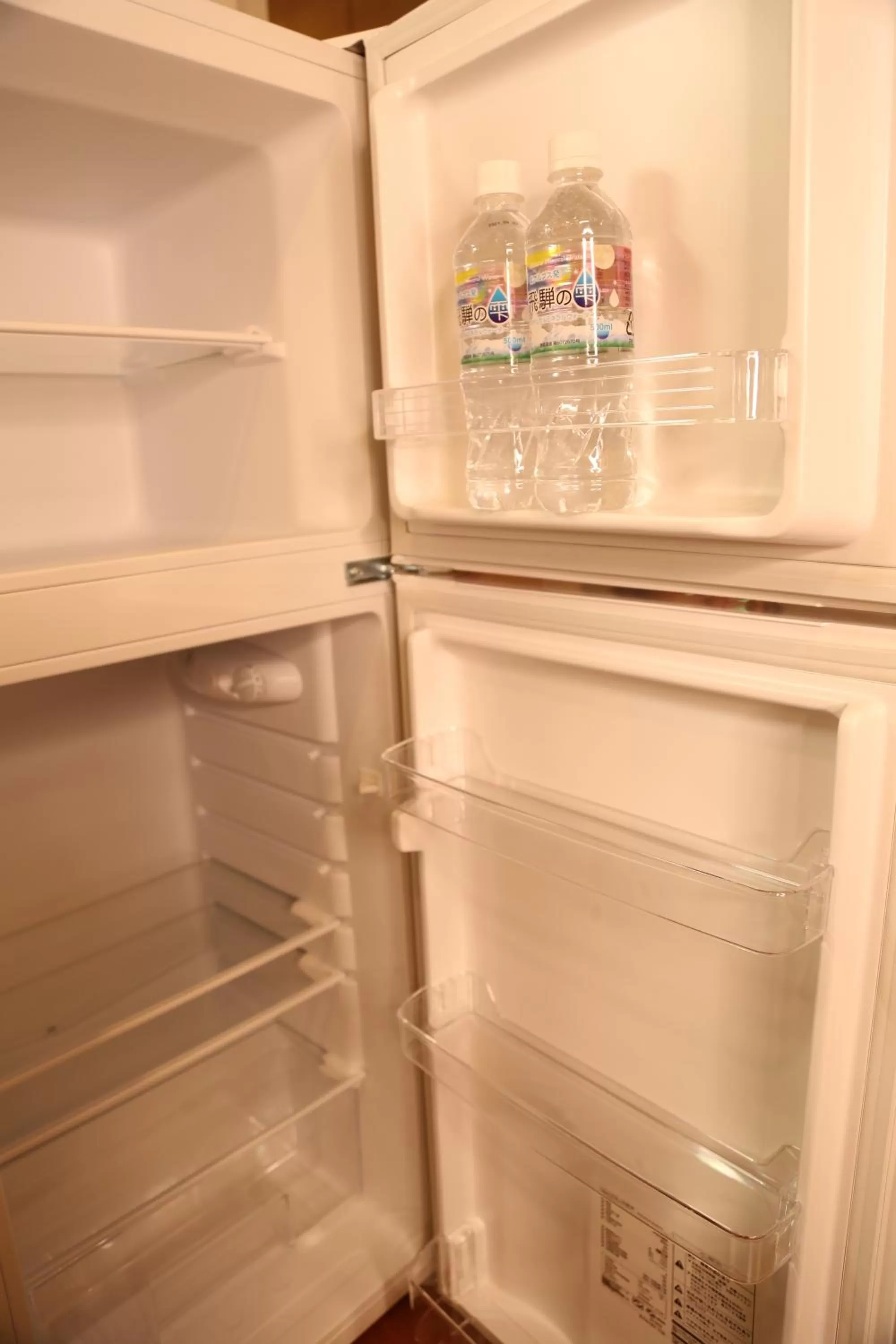 Kitchen or kitchenette in Yoshitsuki kaku - Yoshitsuki Apart Hotel